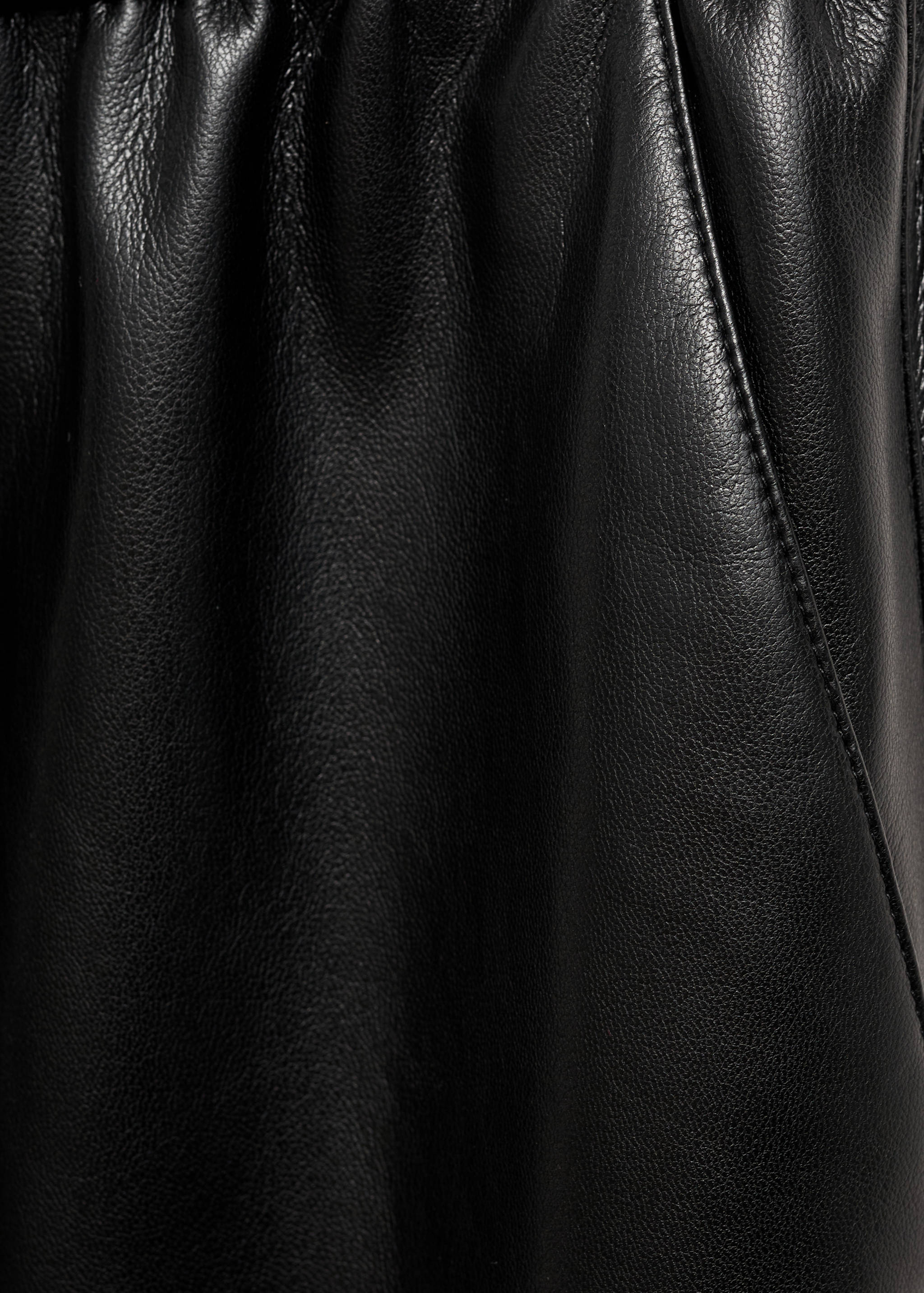 Faux-leather trousers with elastic waist - Details of the article 0