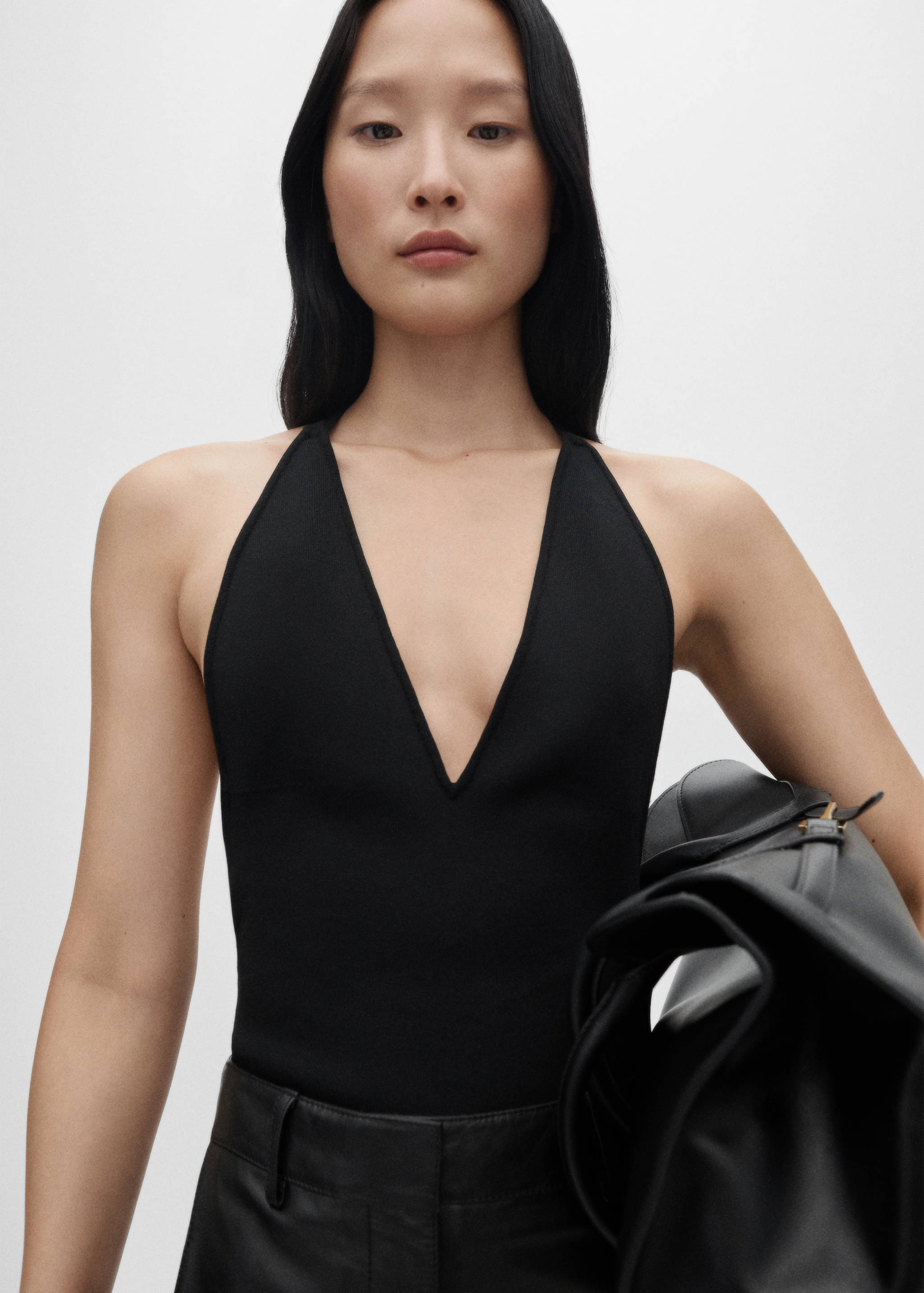 Knitted bodysuit with open back - Medium plane