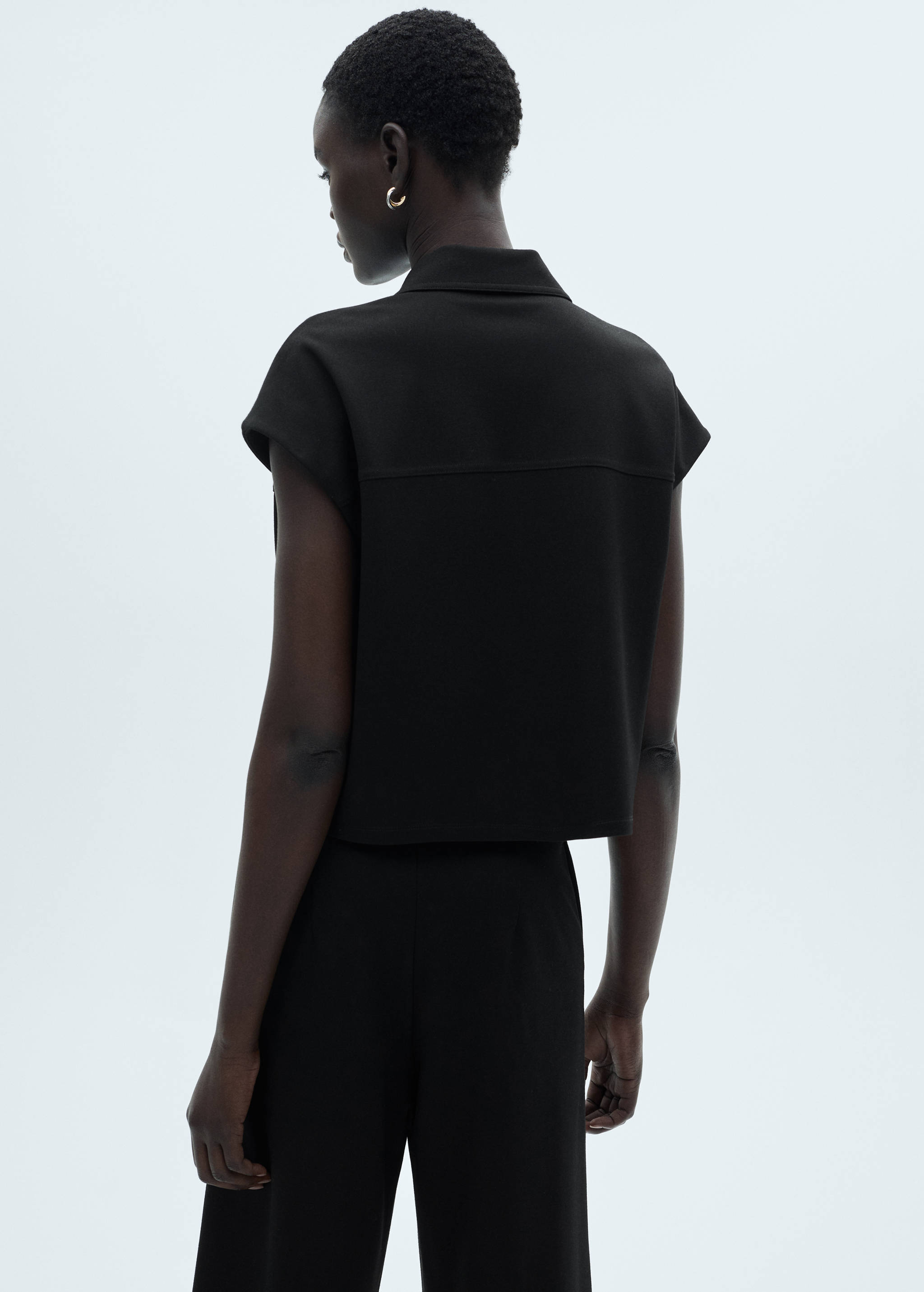 Chaleco botones bolsillos - Reverso del artículo