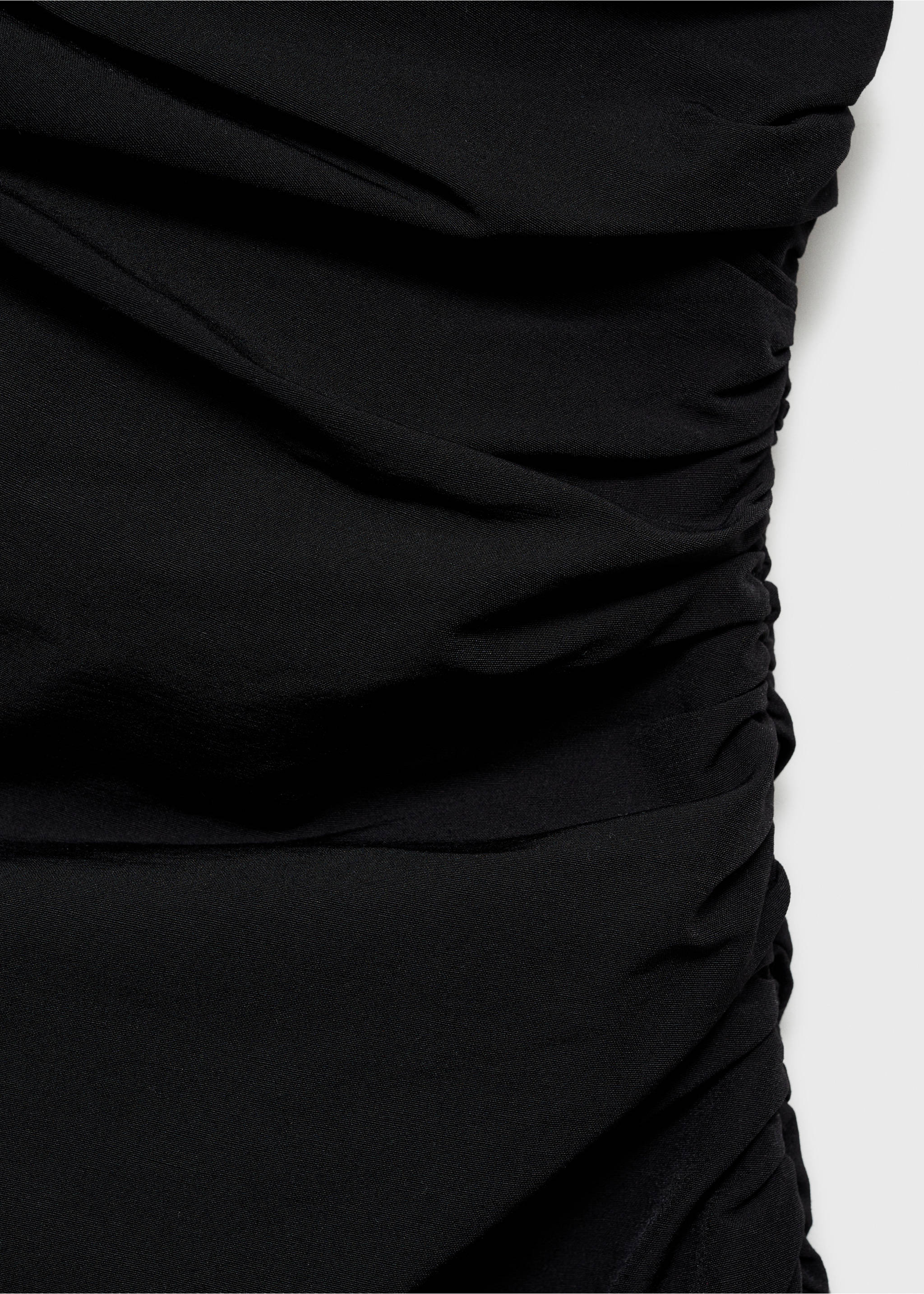 Asymmetrische jurk met gesmokte details - Detail van het artikel 0, Zwart. Ref: 77097689-00.