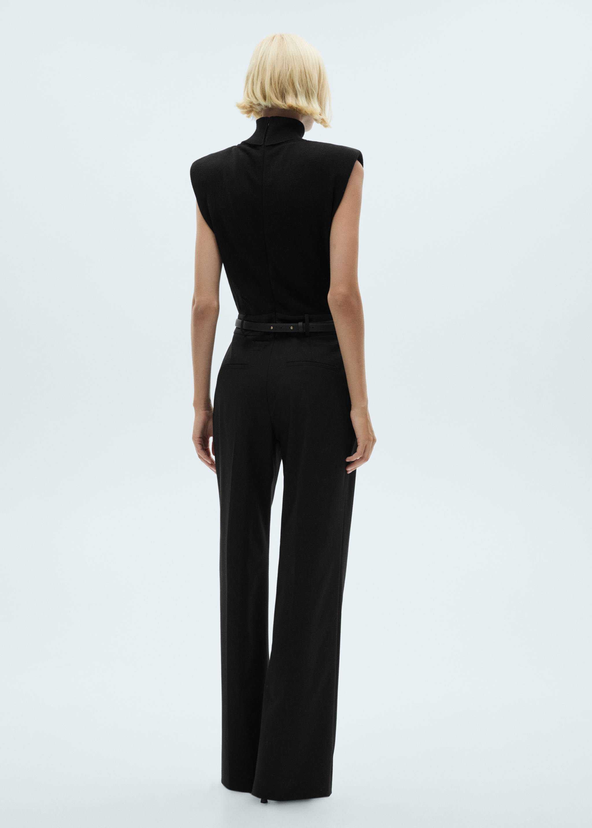 Shoulder padded jumpsuit with belt - Reverse of the article