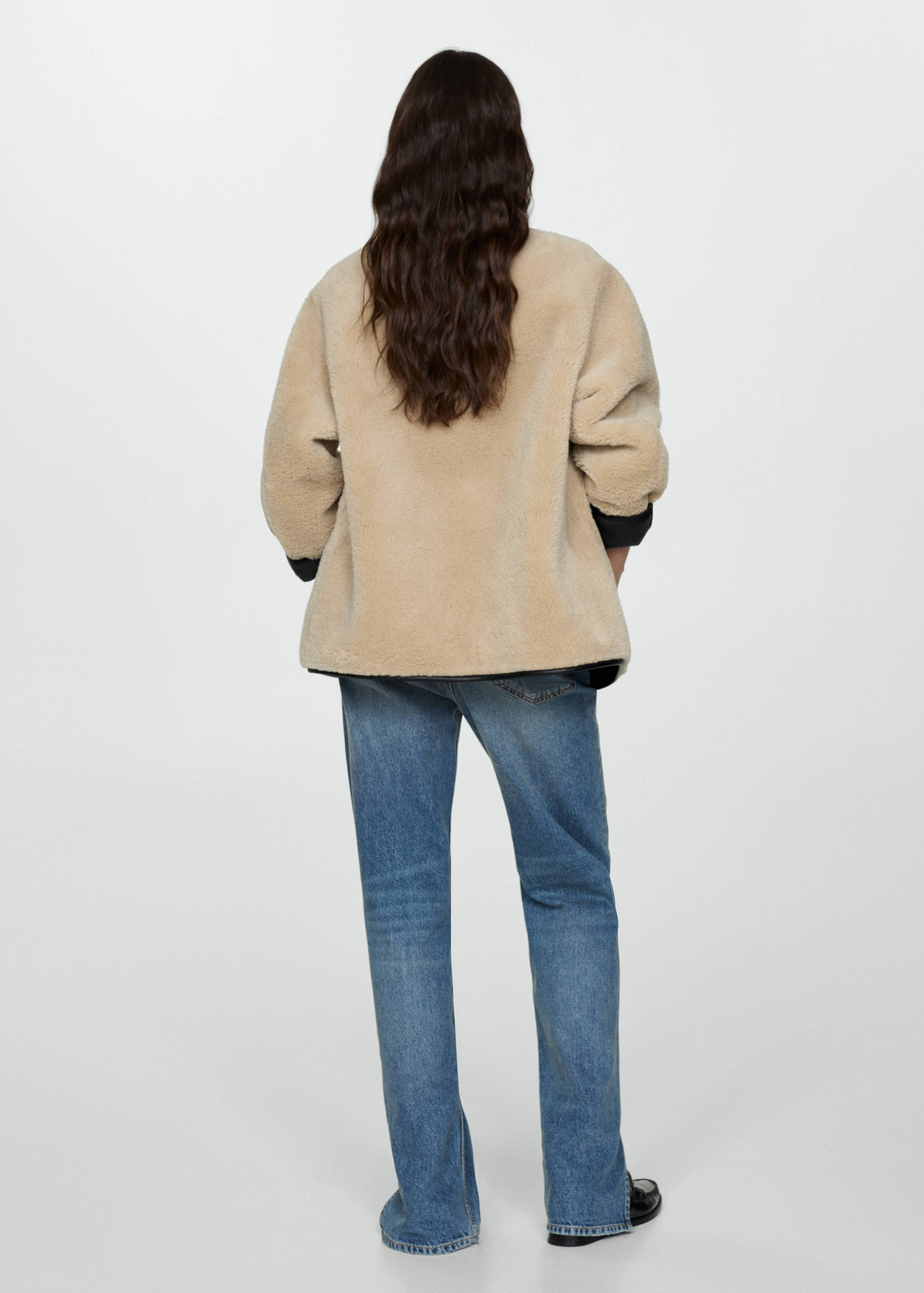 Faux-fur coat with appliqués - Reverse of the article