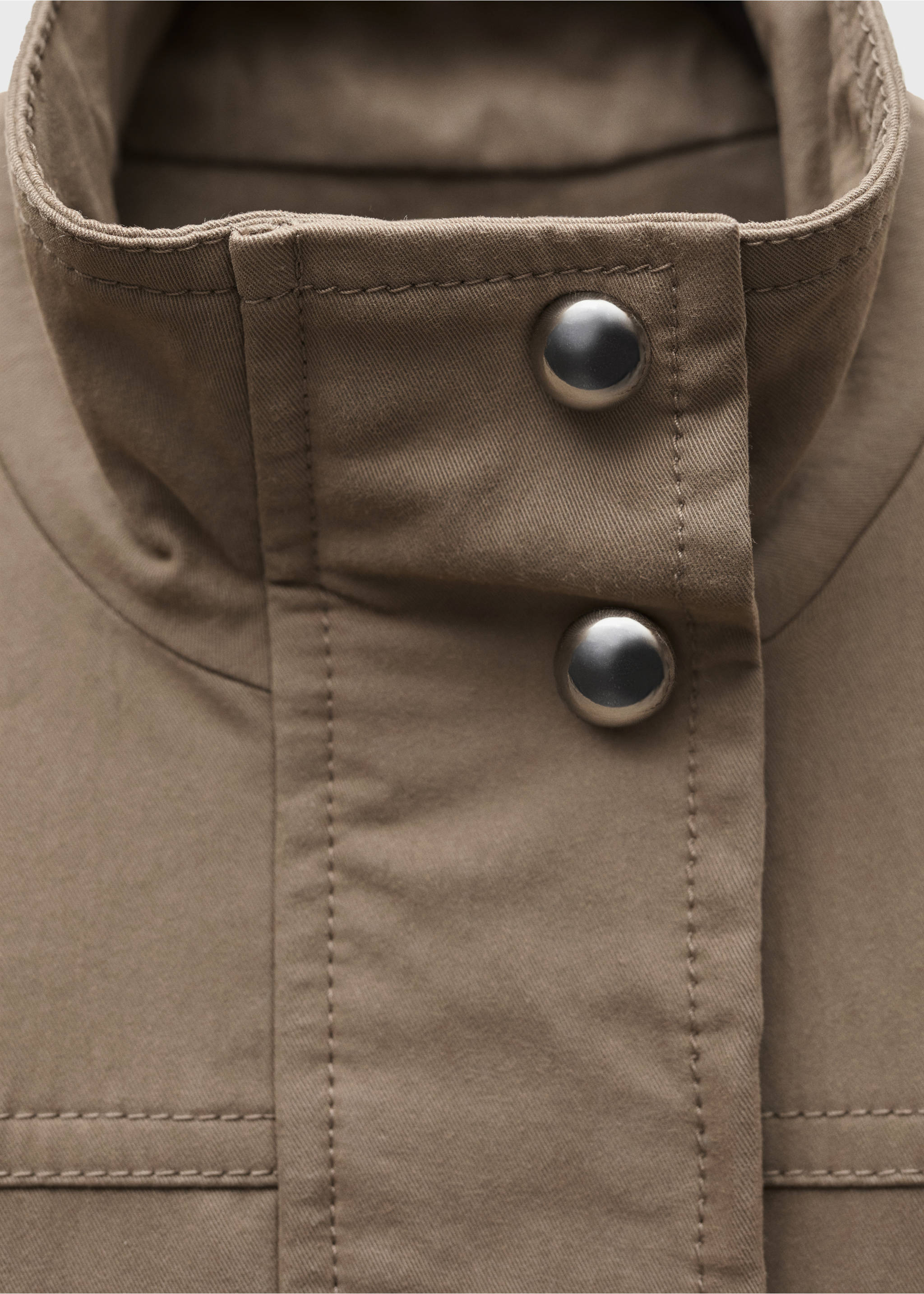 Turtleneck parka with pockets - Details of the article 9, Medium Brown. Ref: 77947938-00.
