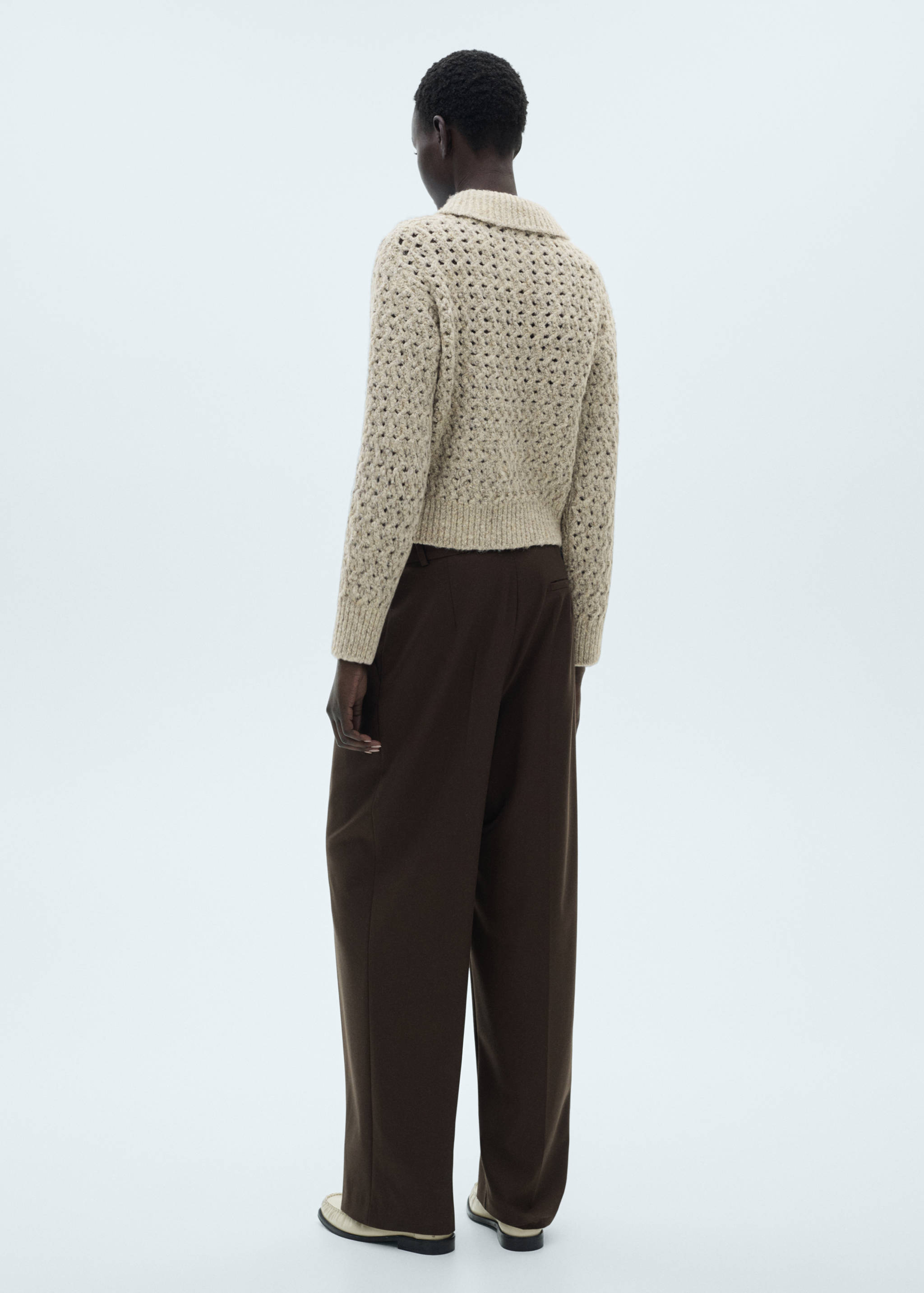 Openwork knitted polo-neck sweater - Reverse of the article
