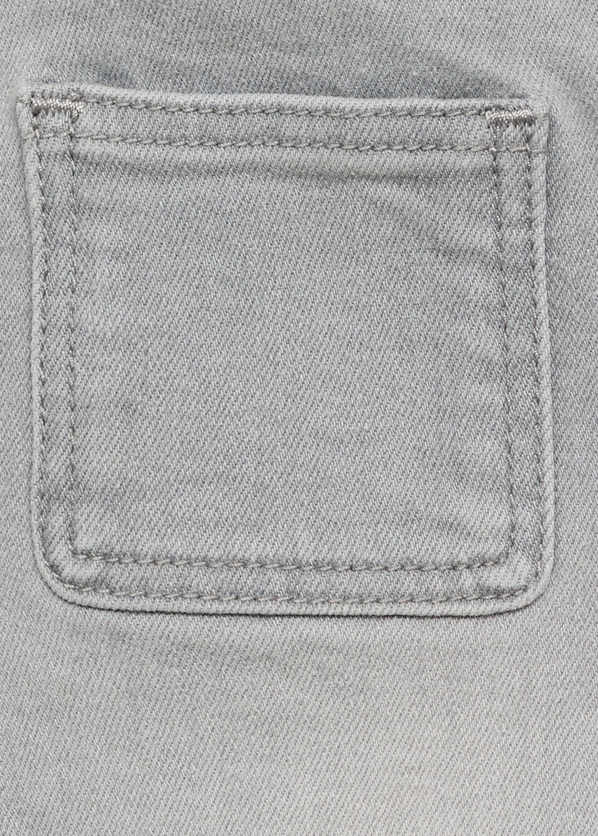 Flared jeans with pocket - Details of the article 0