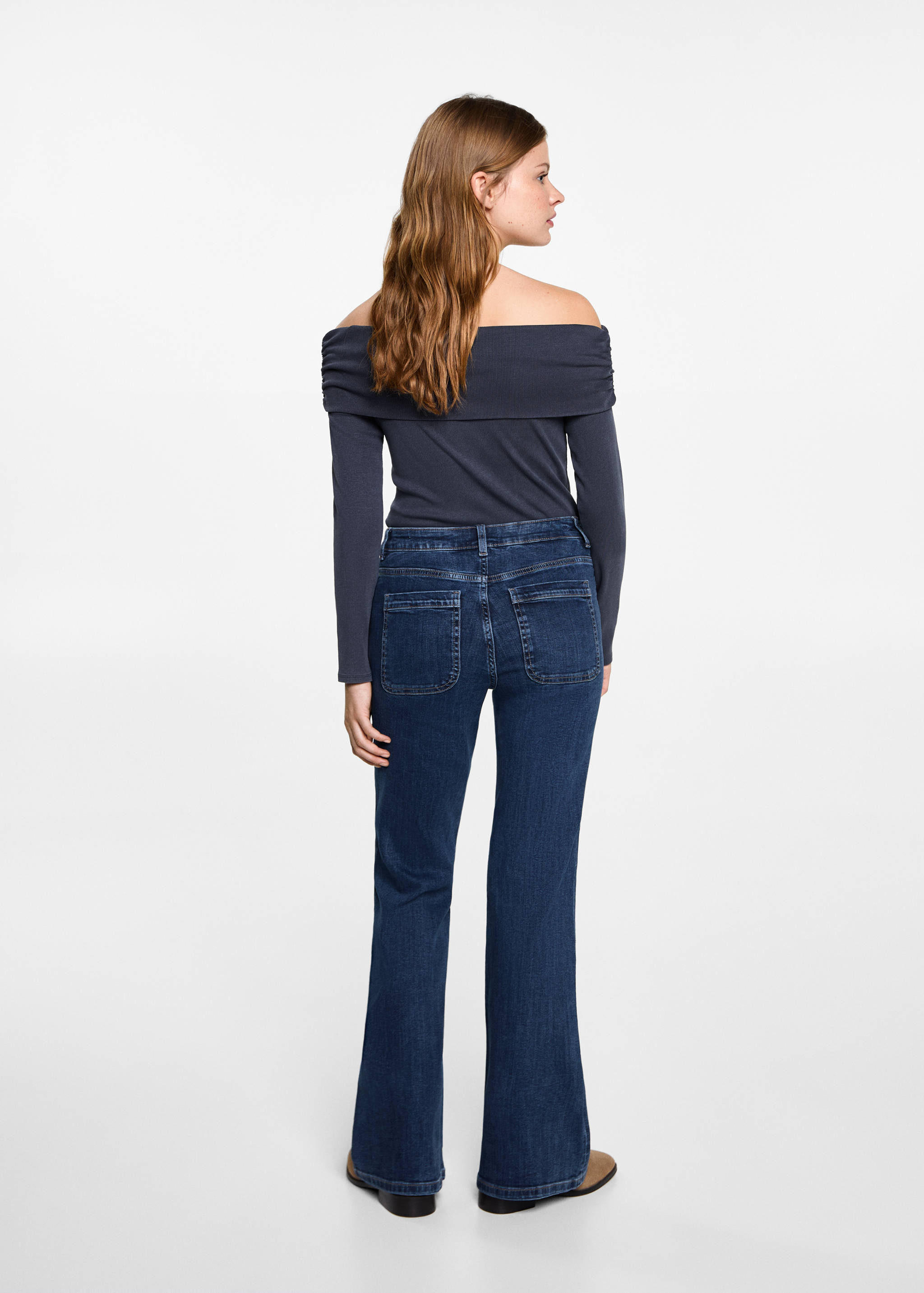 Flared jeans with pocket - Reverse of the article