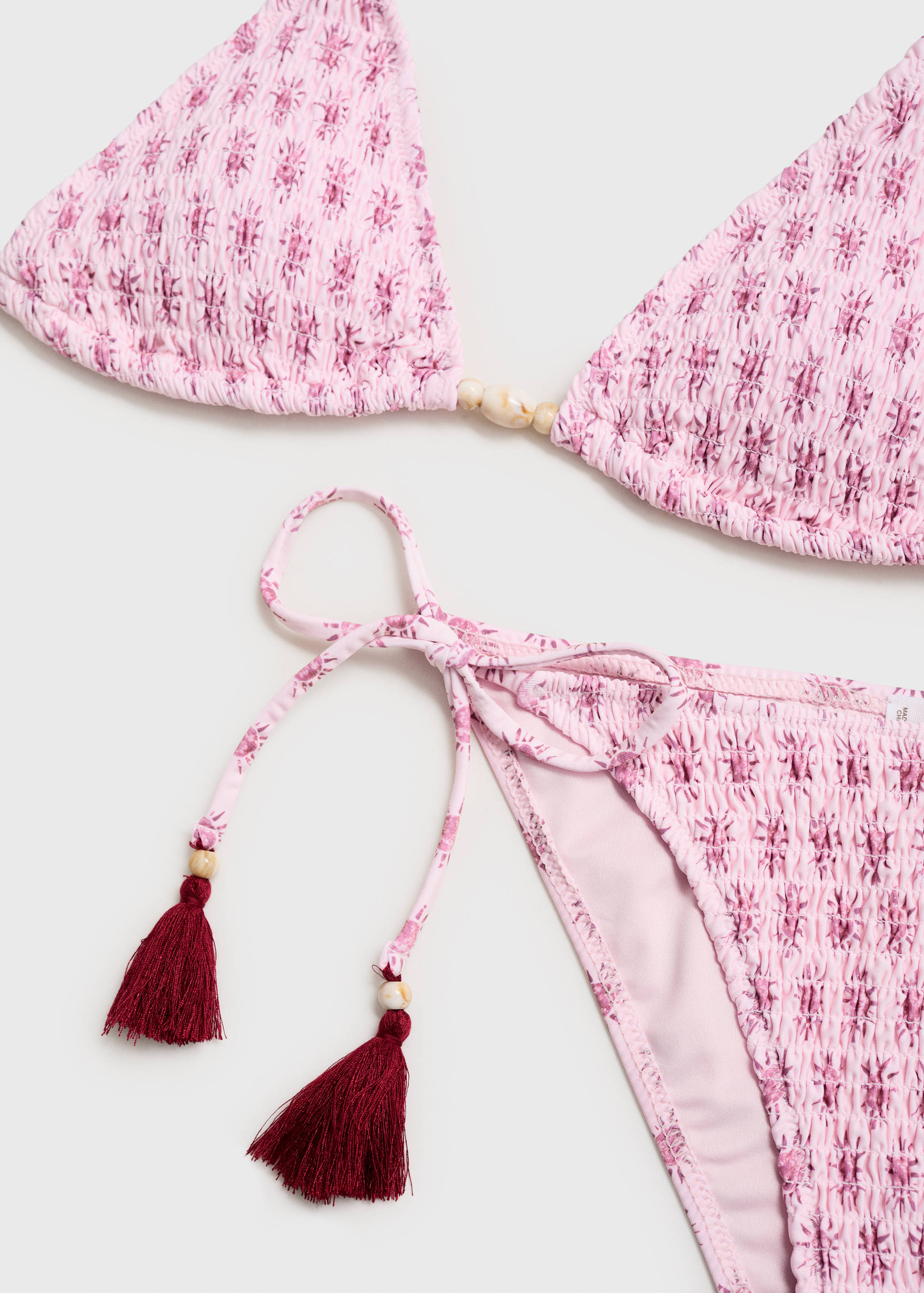 Бикини с принтом и помпонами - Деталь изделия 0