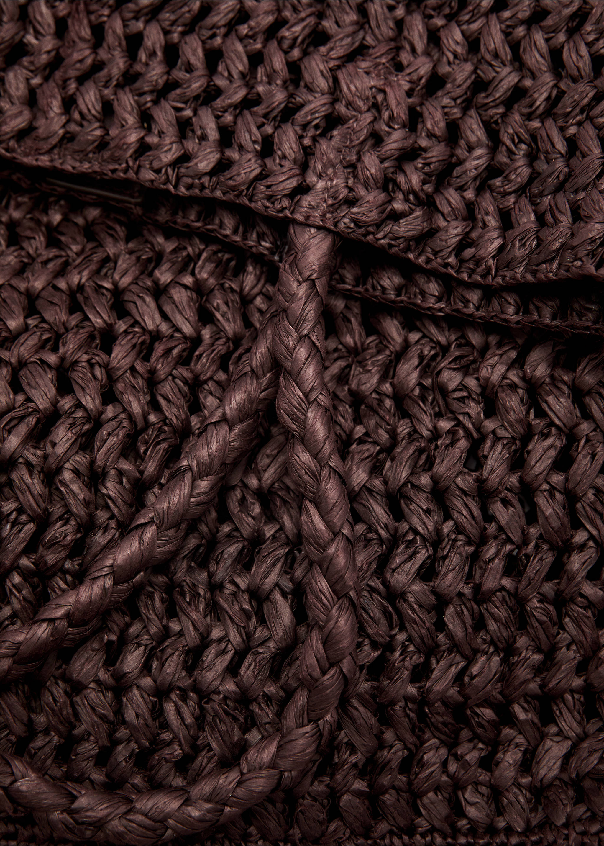 Dark brown woven straw bag close-up showing texture., Chocolate. Ref: 87007165-01.