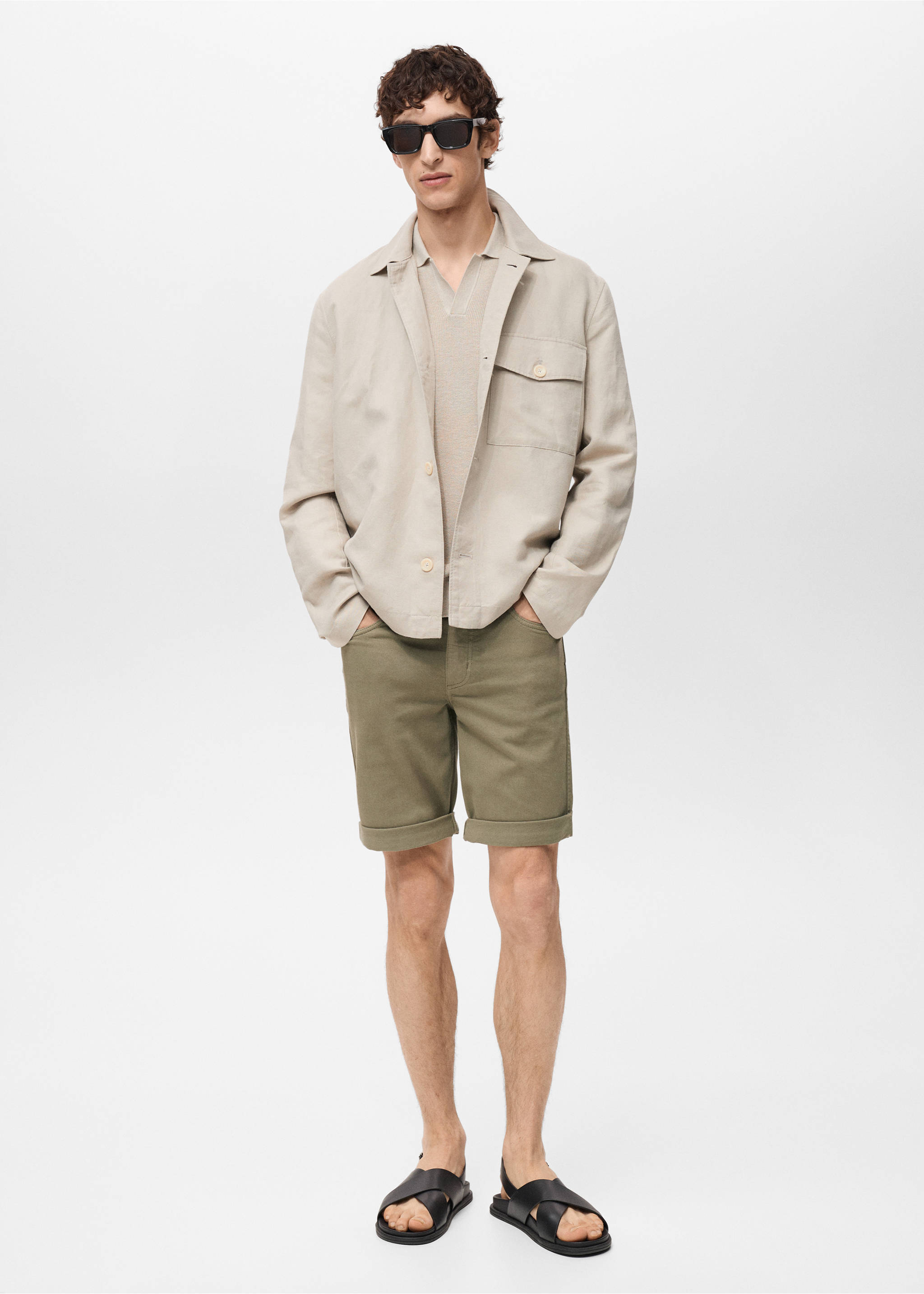 Khaki green bermuda shorts with cuffed hems, worn with an overshirt and polo., Khaki. Ref: 87007893-00.