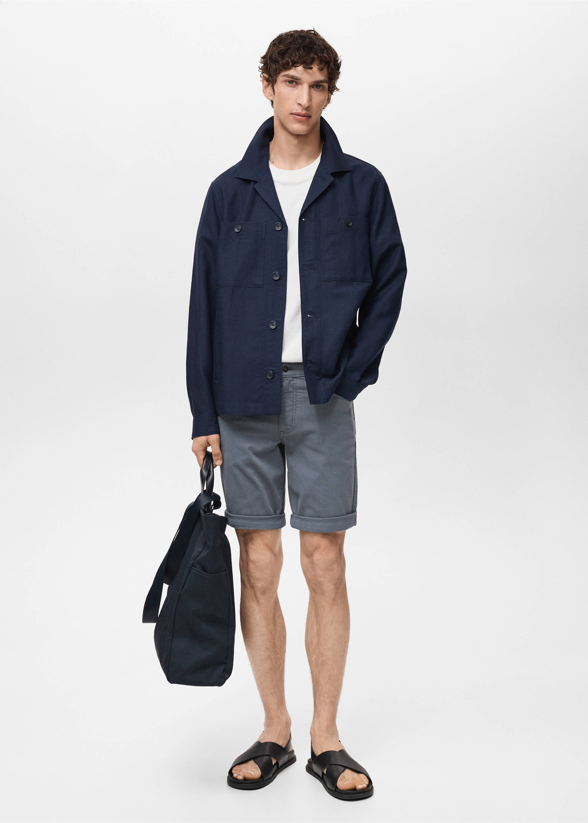 Grey bermuda shorts styled with a navy blue overshirt and bag., Indigo Blue. Ref: 87007893-00.