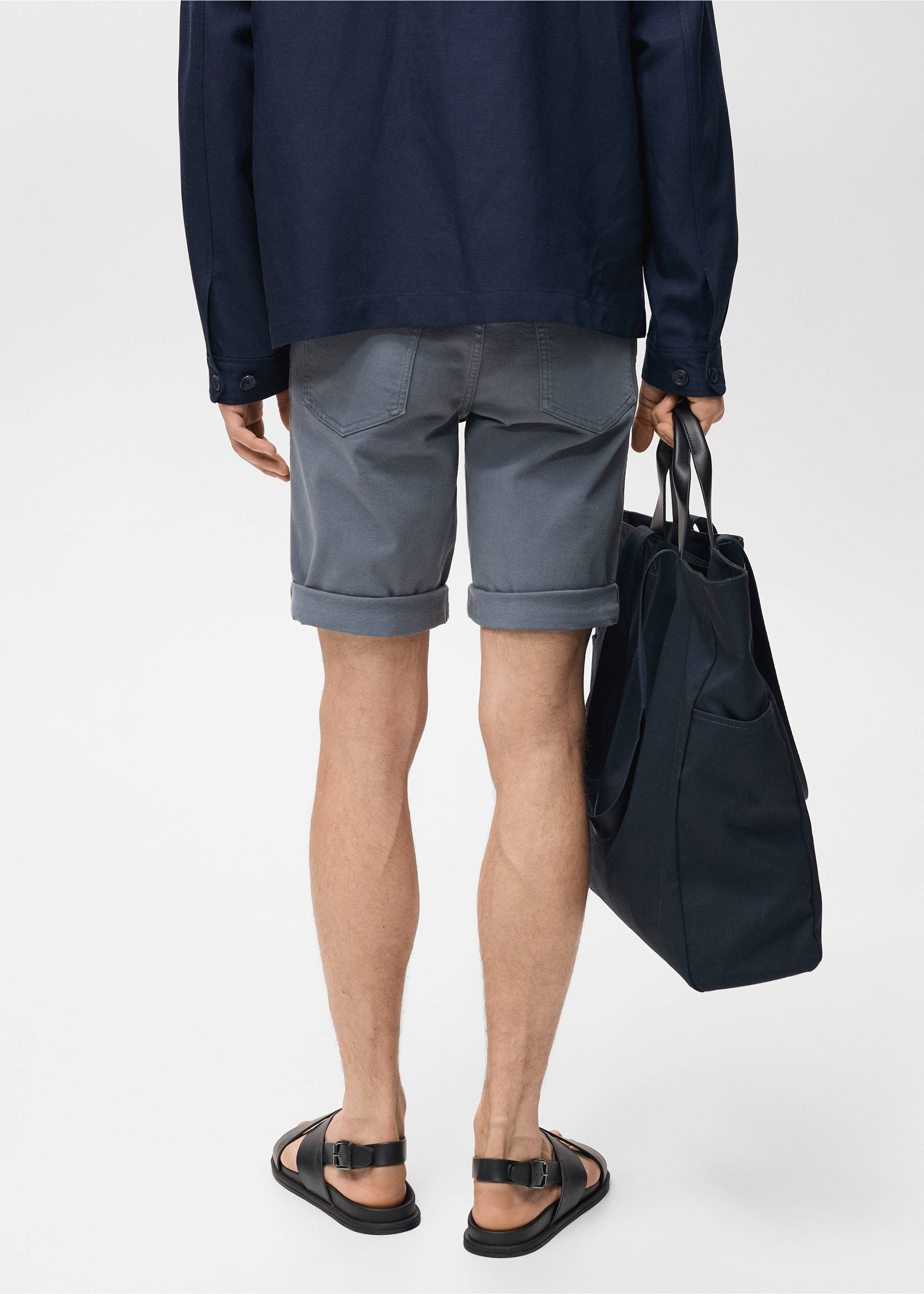 Back view of dark grey bermuda shorts with cuffed hems., Indigo Blue. Ref: 87007893-00.