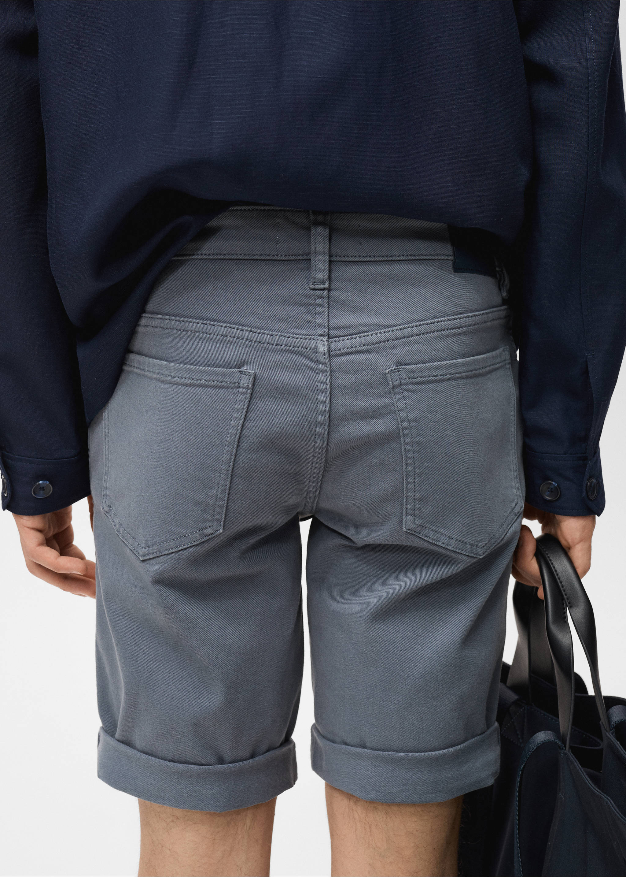 Grey denim bermuda shorts with turned-up cuffs, back view, Indigo Blue. Ref: 87007893-00.