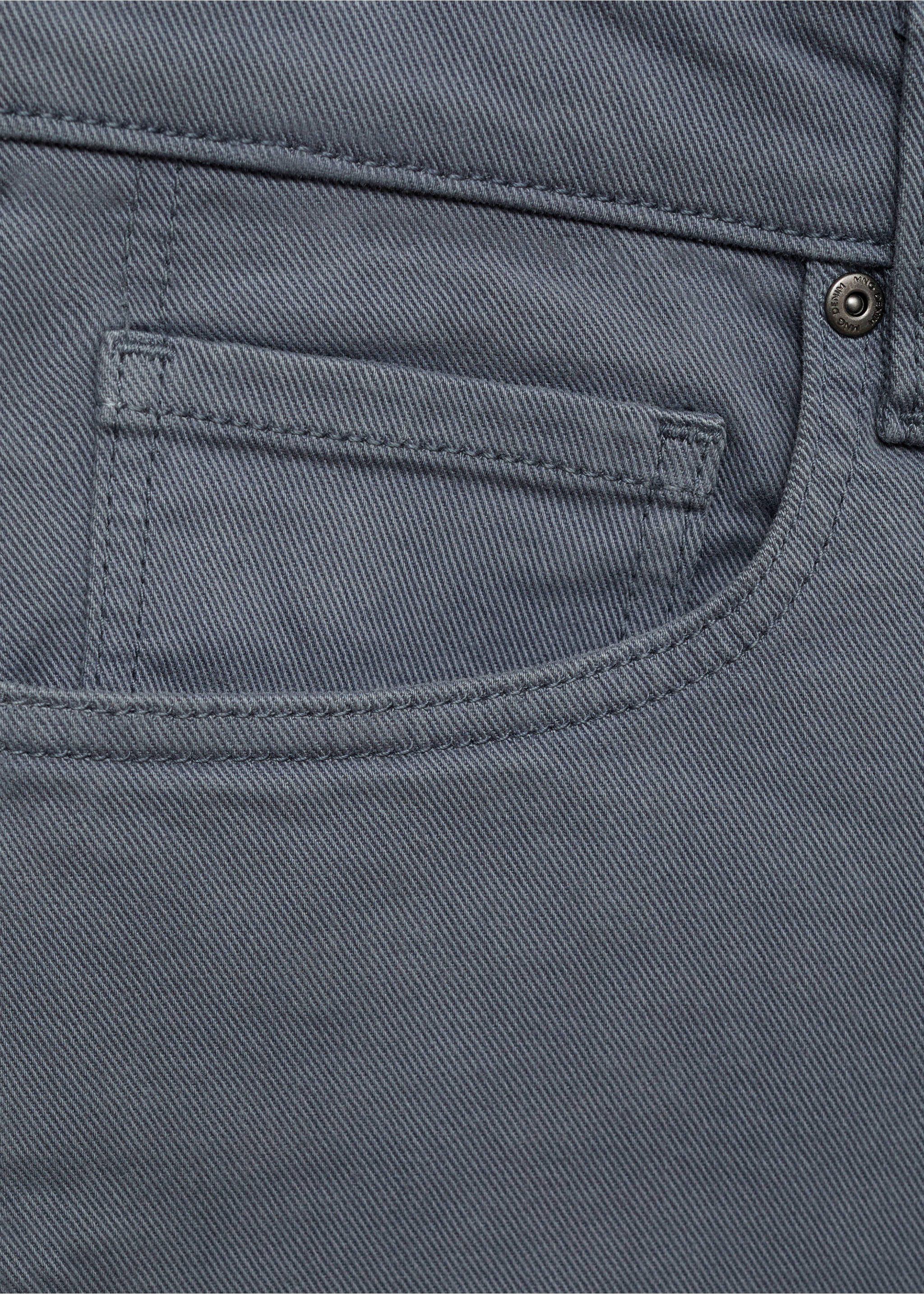 Close-up of dark grey bermuda shorts front pocket., Indigo Blue. Ref: 87007893-00.