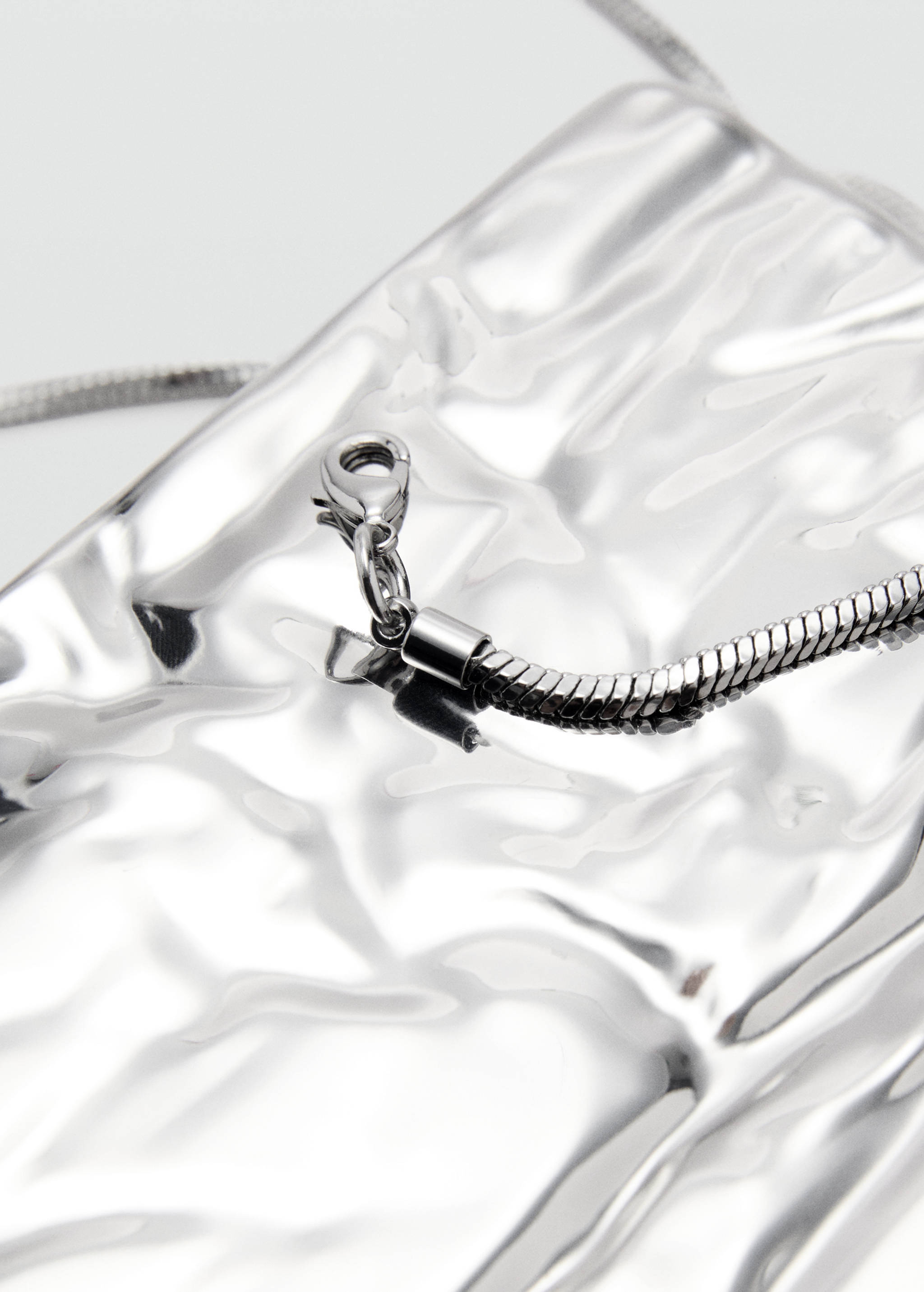 Textured clutch bag - Details of the article 1