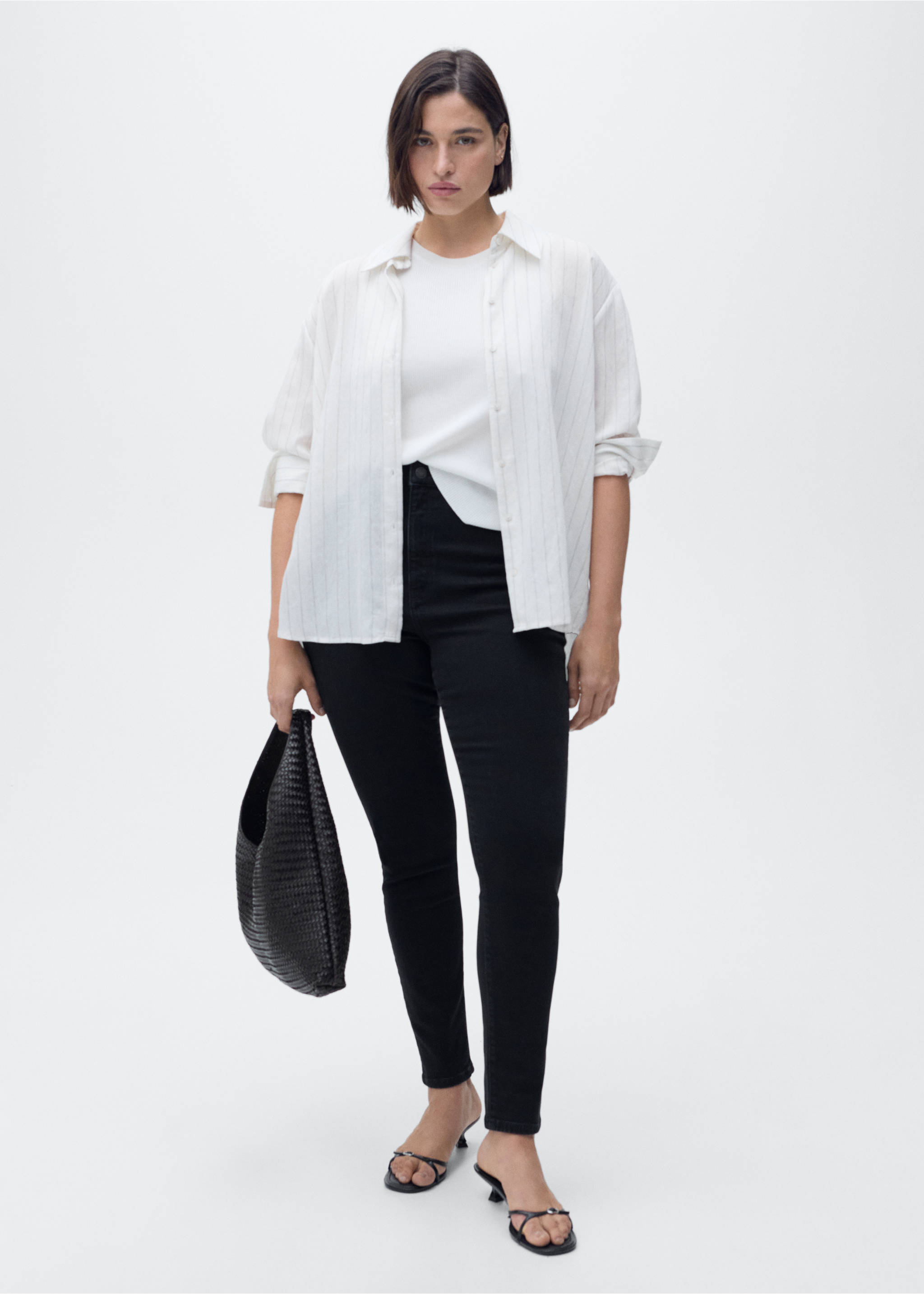 High-rise skinny jeans - Details of the article 3, Black denim. Ref: 87010285-00.