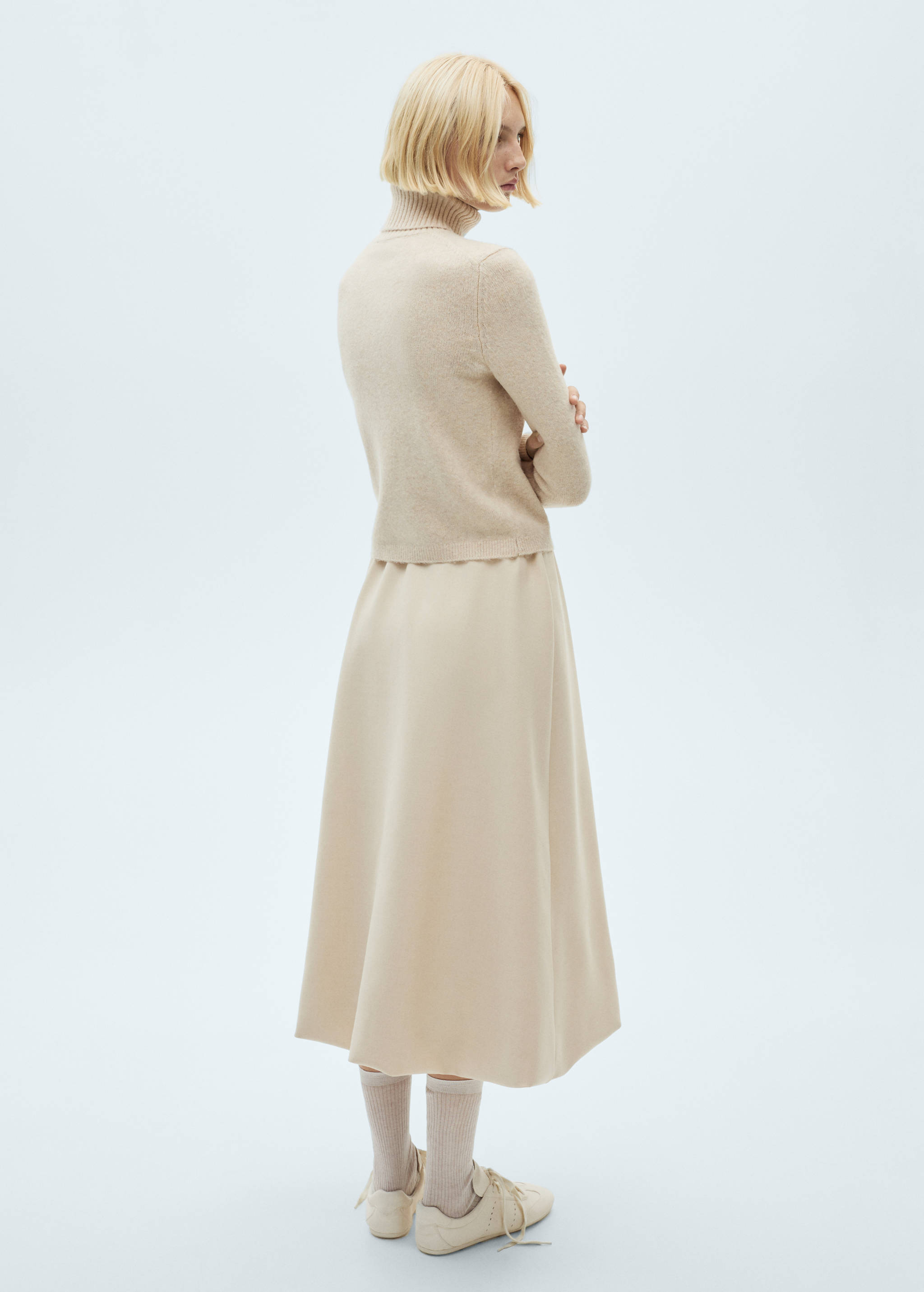 Turtle neck sweater - Reverse of the article