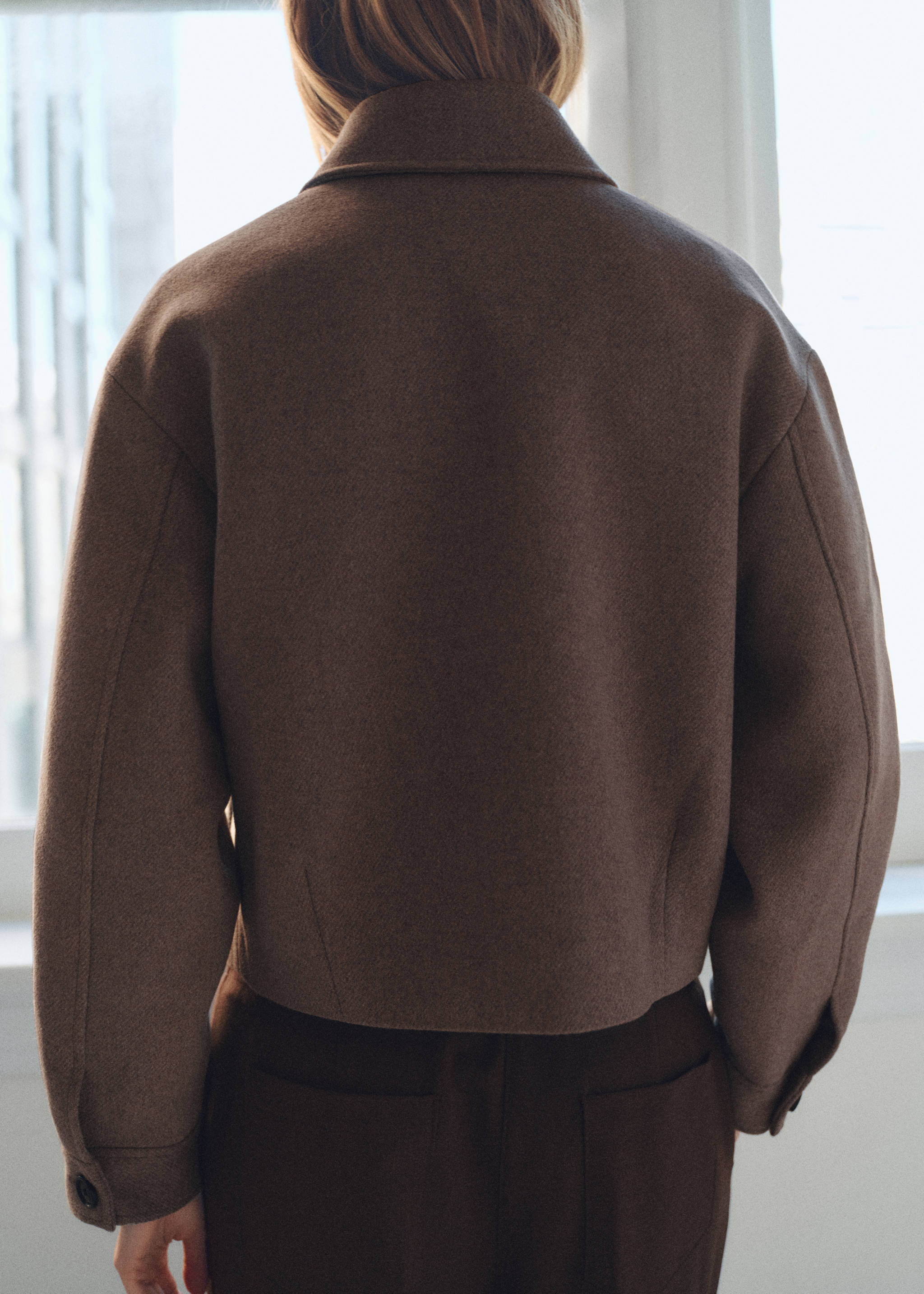 Wool jacket with pockets - Reverse of the article