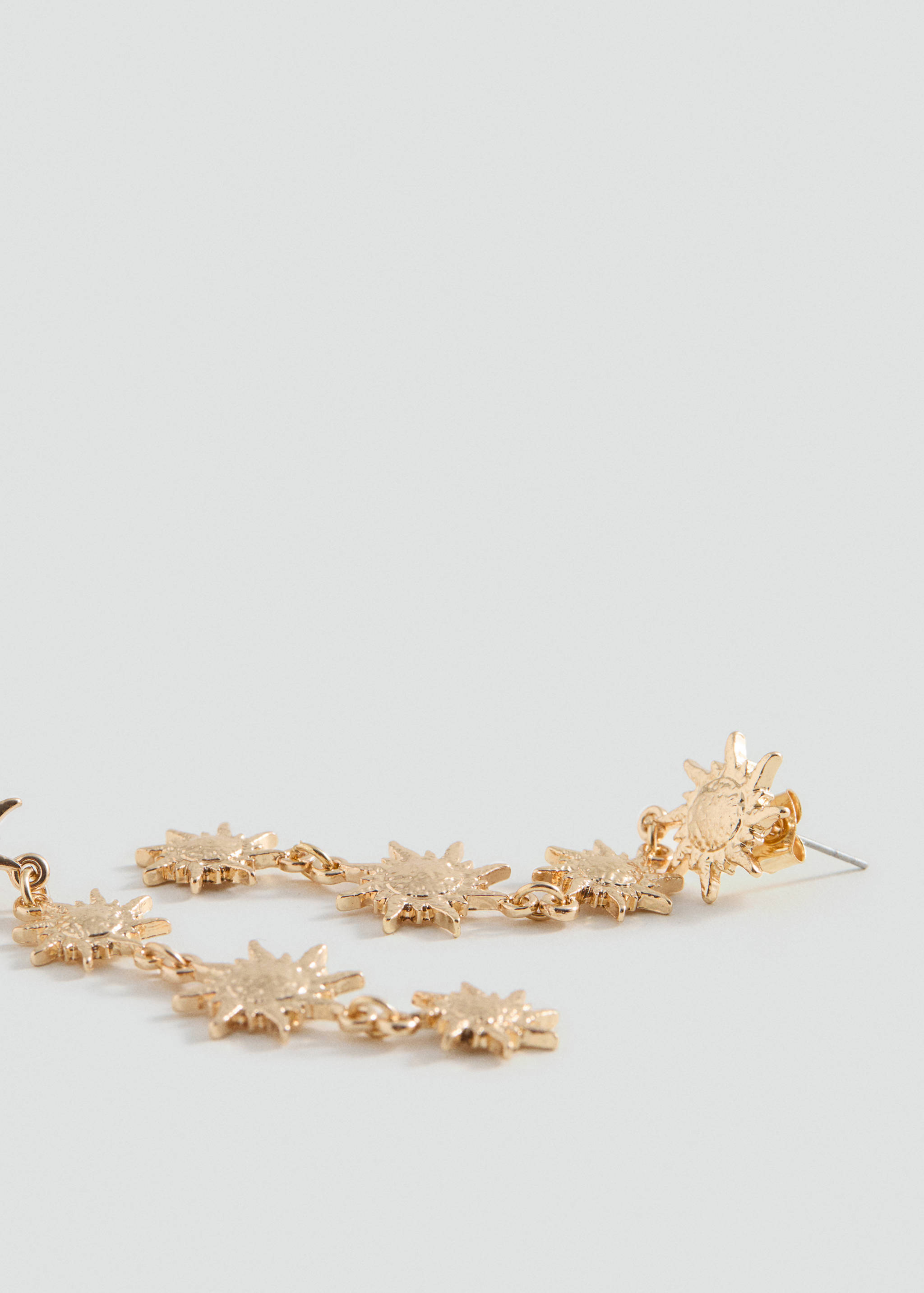 Boucles d'oreilles pendantes soleils - Plan moyen