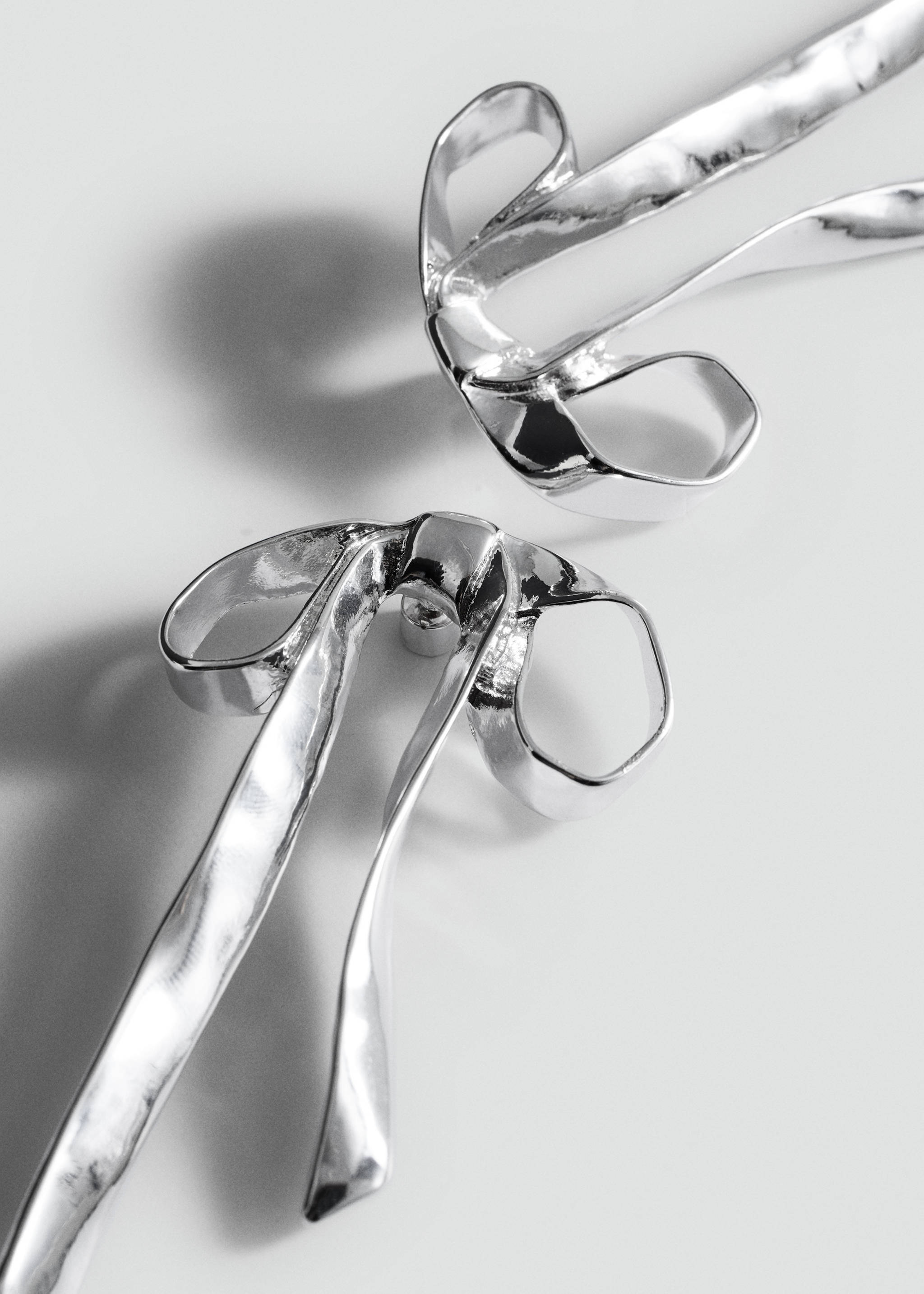 Rigid bow earrings - Medium plane