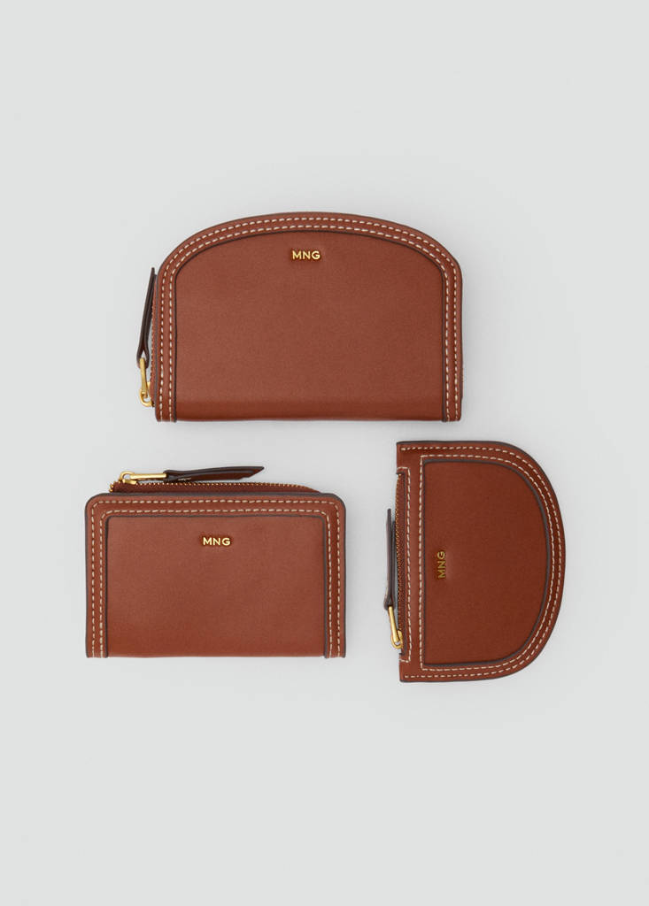 Oval-shaped faux-leather wallet — Leather