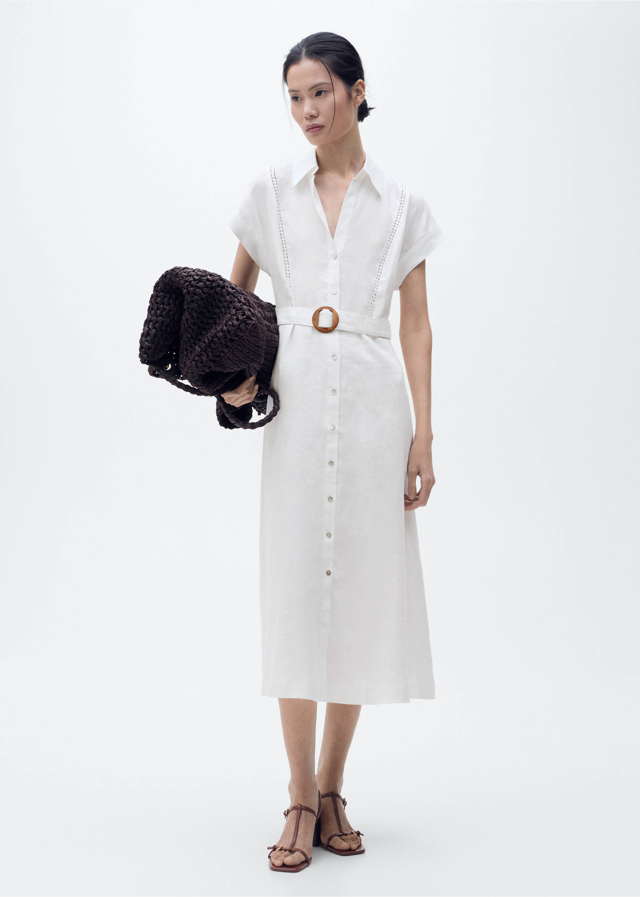 White midi shirt dress with short sleeves, a button placket, and a matching belt with a circular wooden buckle., White. Ref: 87018644-00.