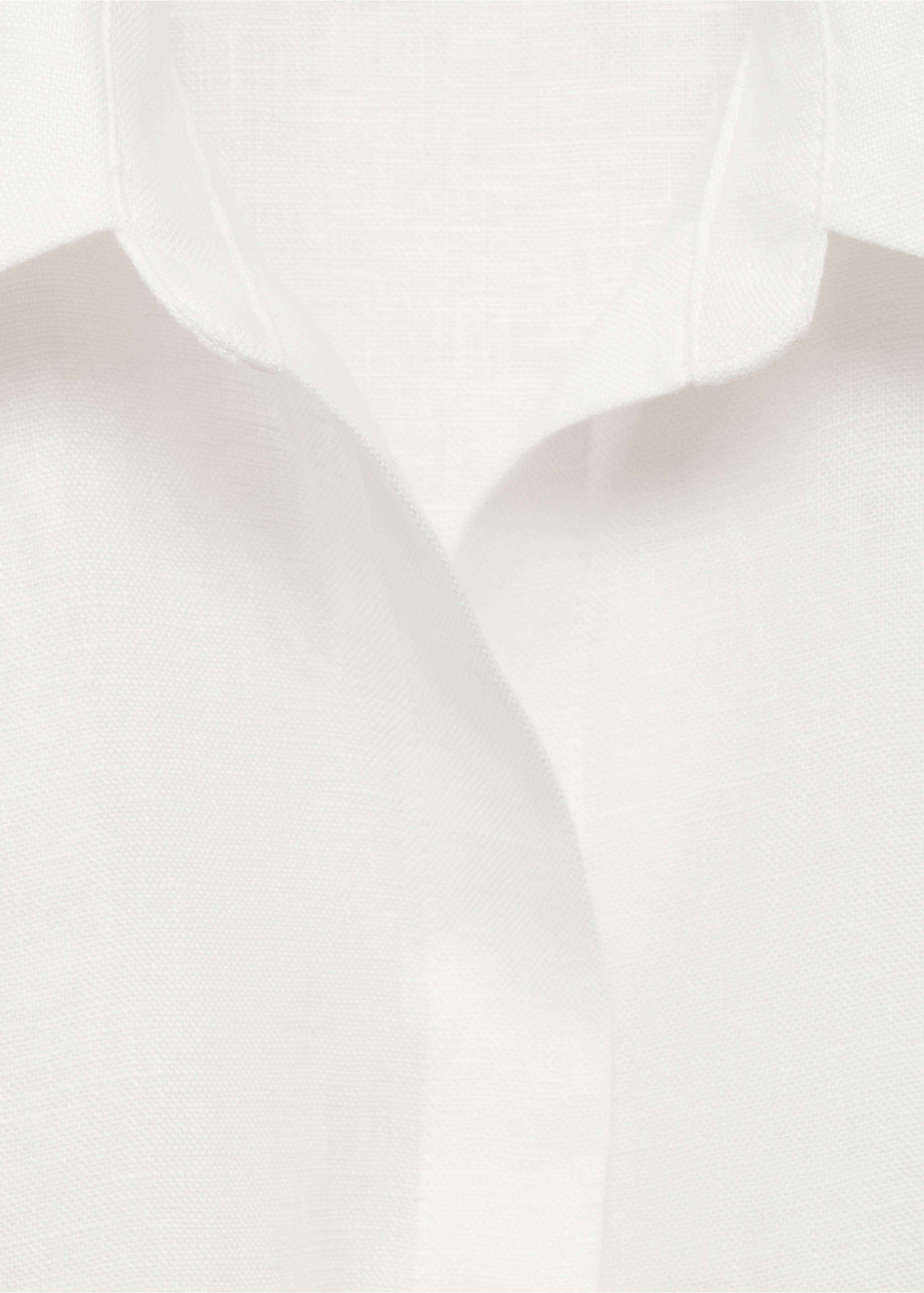 Close-up of white dress fabric and collar texture., White. Ref: 87018644-00.