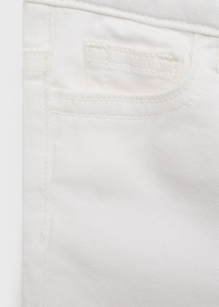 Frayed low-rise skinny jeans — White
