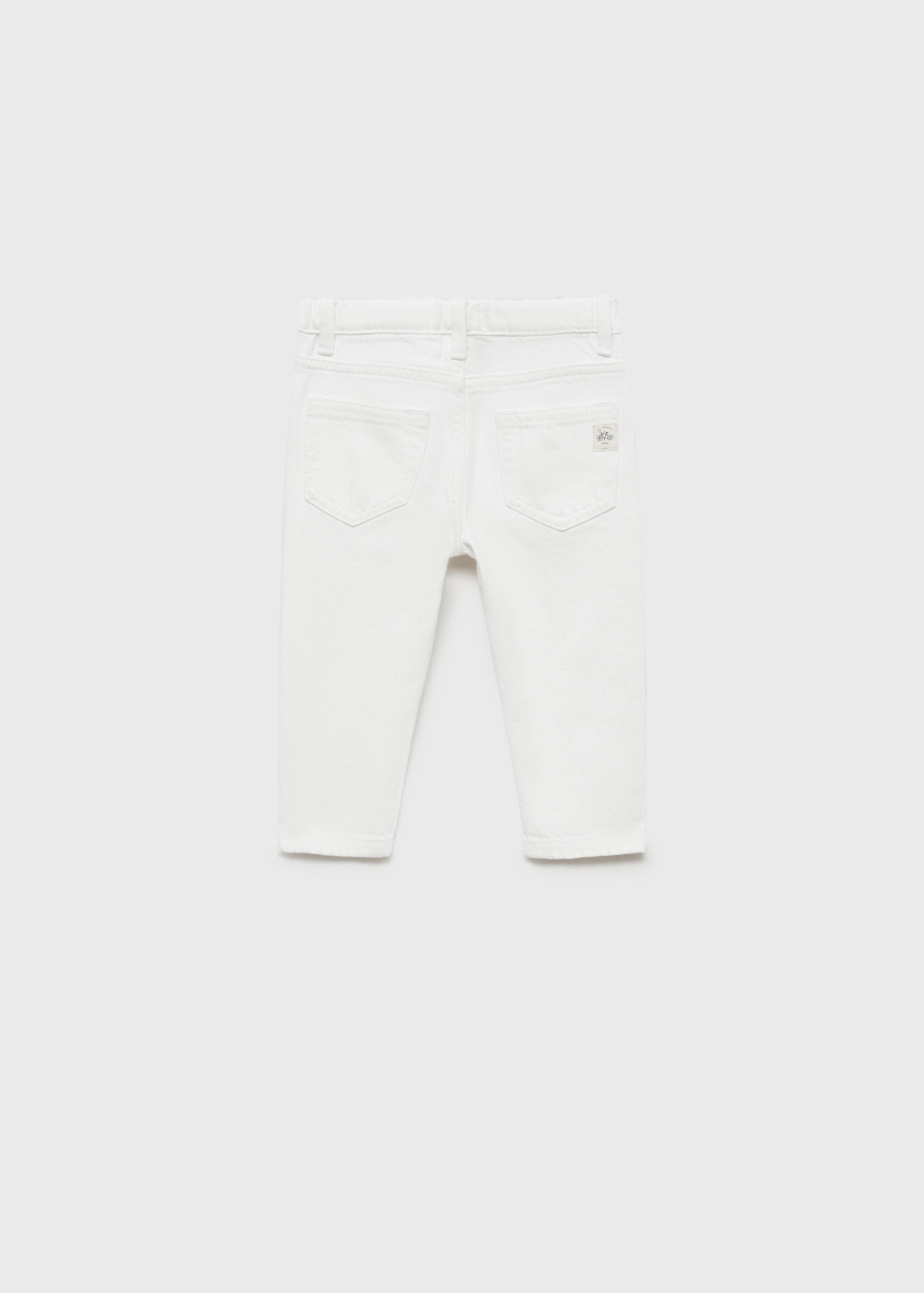 Jeans skinny rotos decorativos - Reverso del artículo