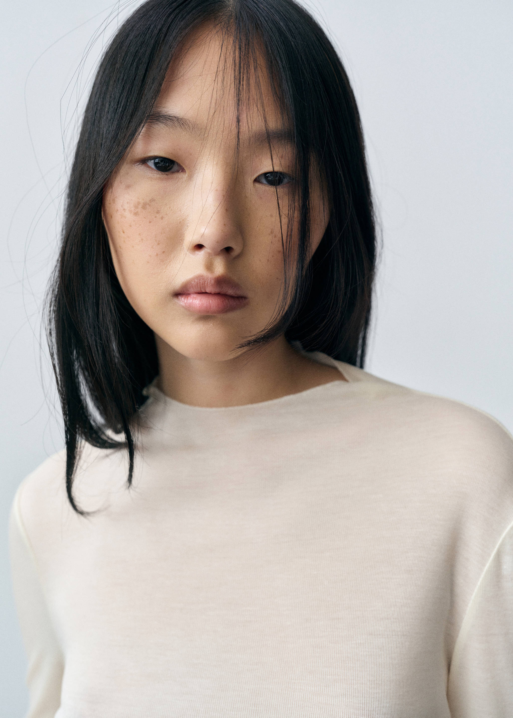 Langärmliges T-Shirt mit halbhohem Kragen - Detail des Artikels 1