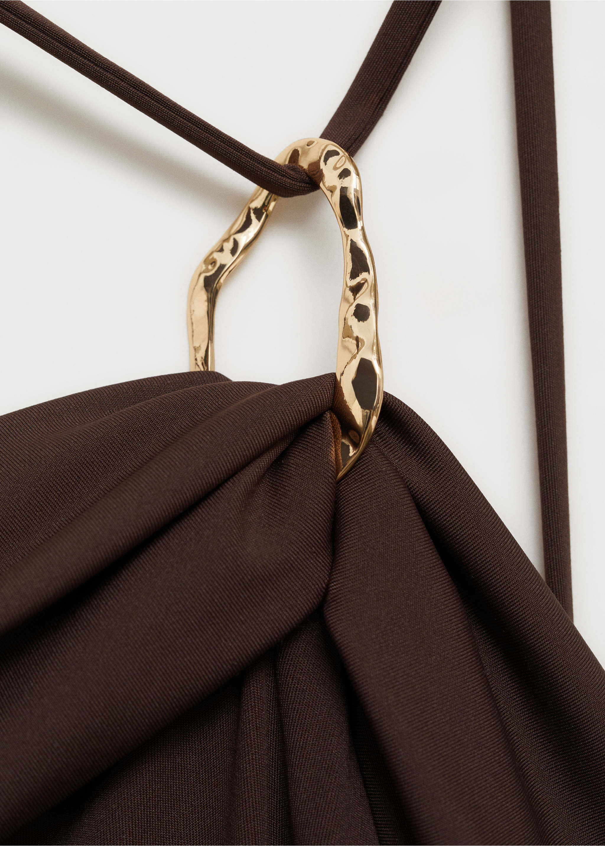 Brown swimsuit detail with gathered fabric and a gold metallic ring., Chocolate. Ref: 87024390-00.