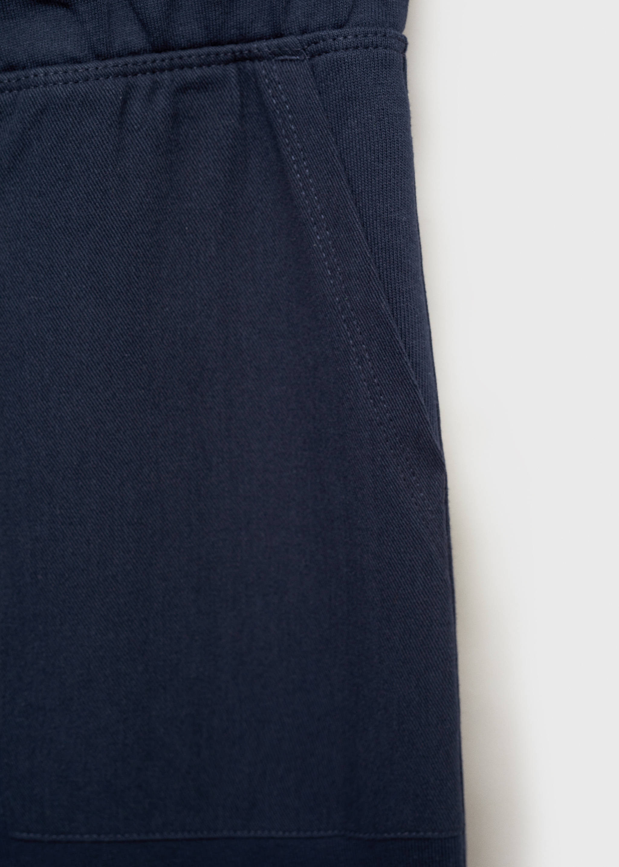 Cotton jogger-style trousers - Details of the article 0