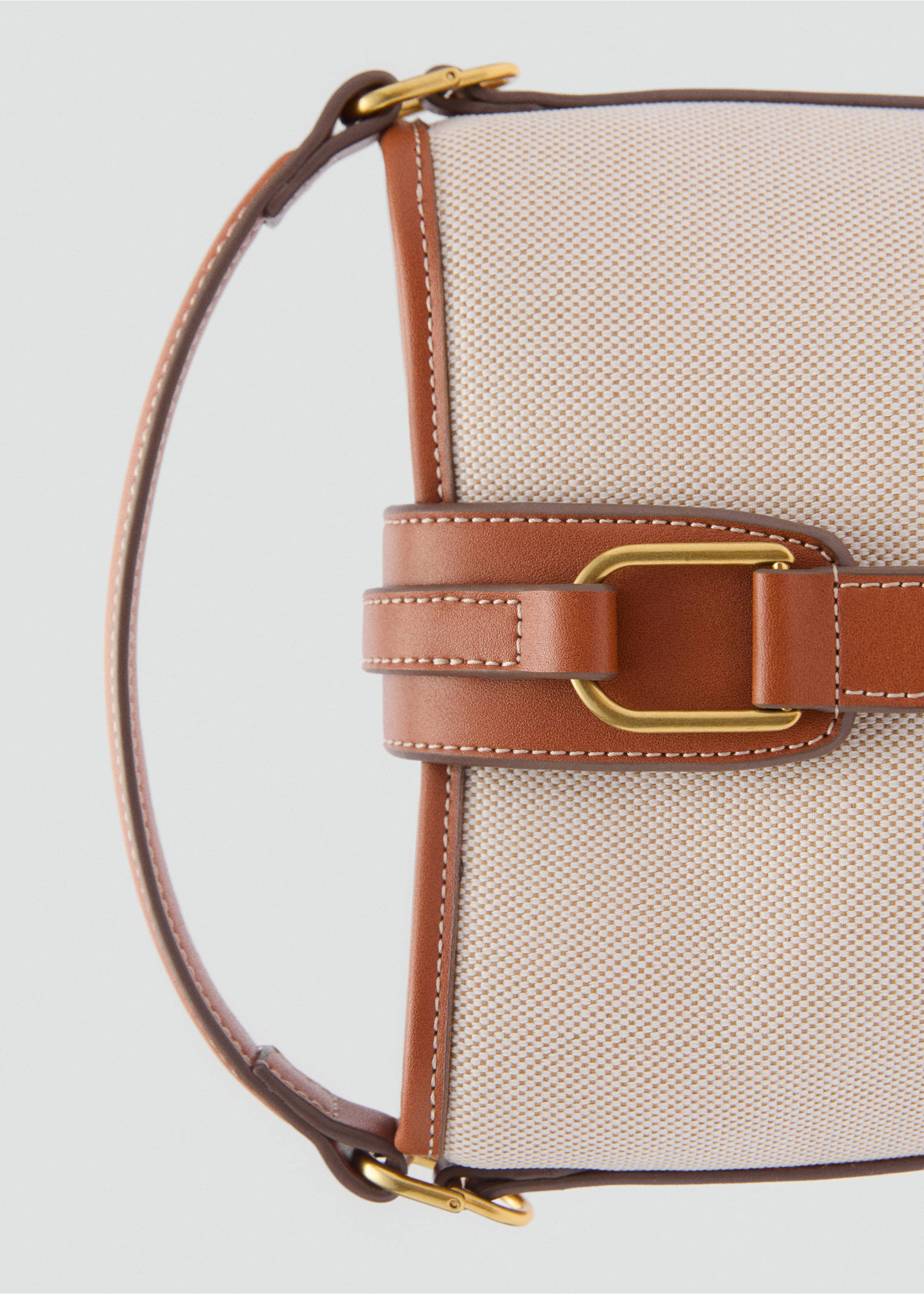 Contrasting canvas bucket bag - Details of the article 4, Leather. Ref: 87025743-00.