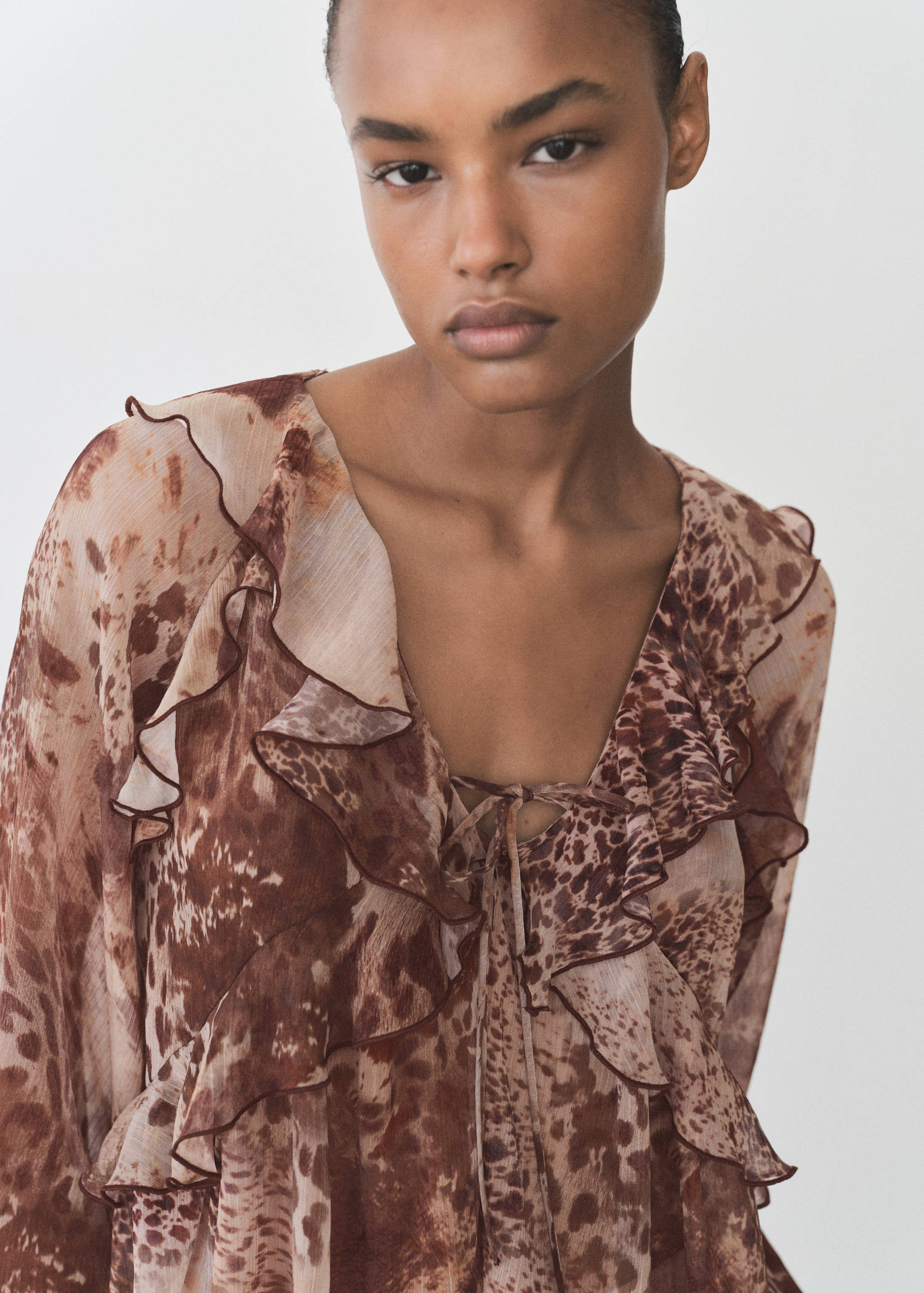 Printed blouse with ruffles and bow detail - Details of the article 1