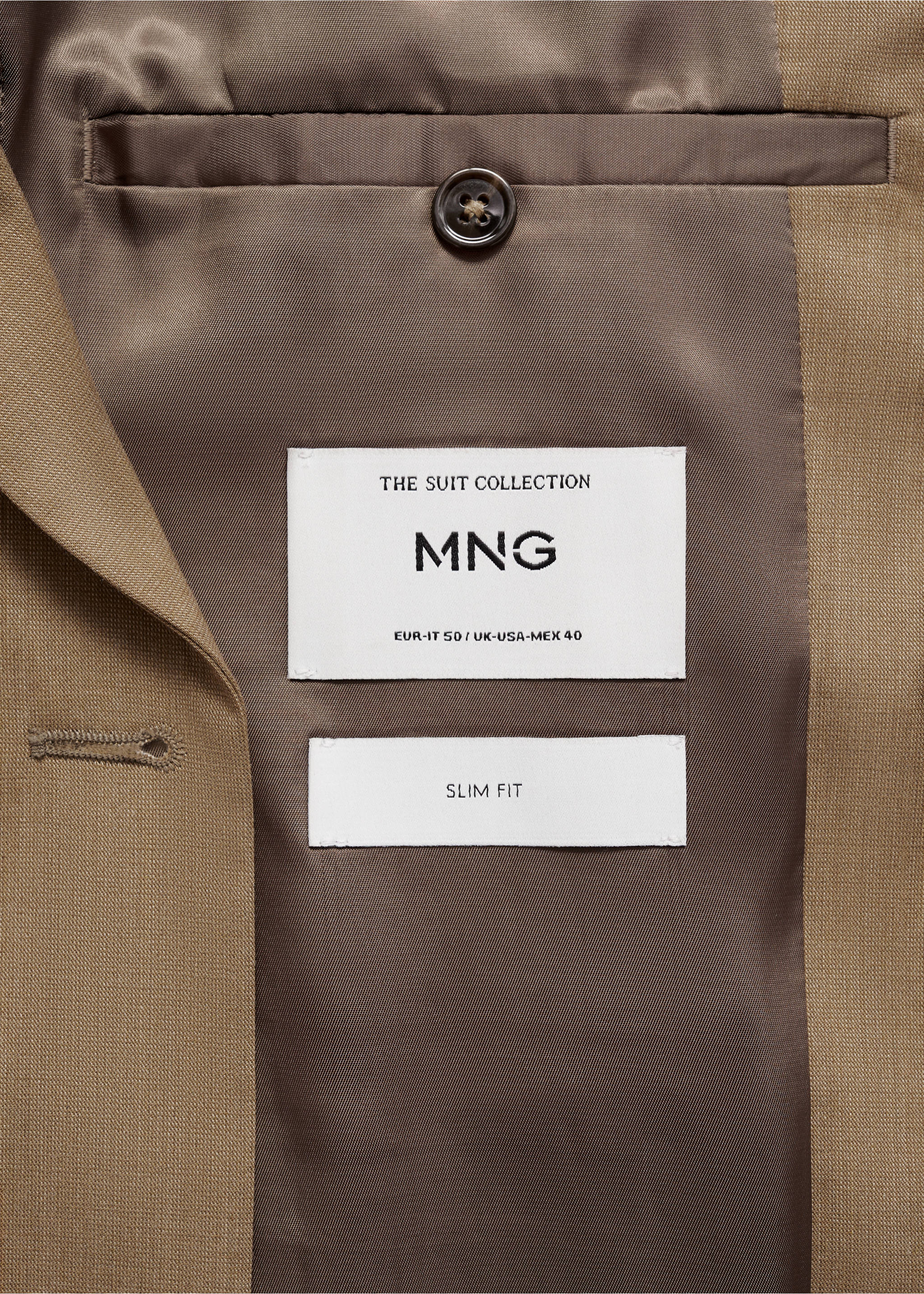 Close-up of the interior labels and brown lining of a slim fit suit blazer., Medium Brown. Ref: 87025929-00.