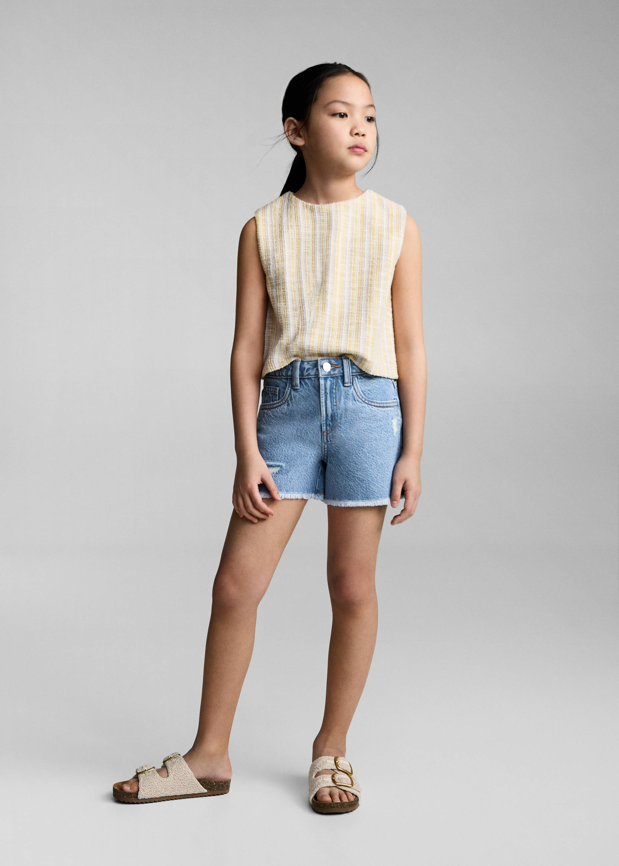 Denim shorts with frayed hem - General plane