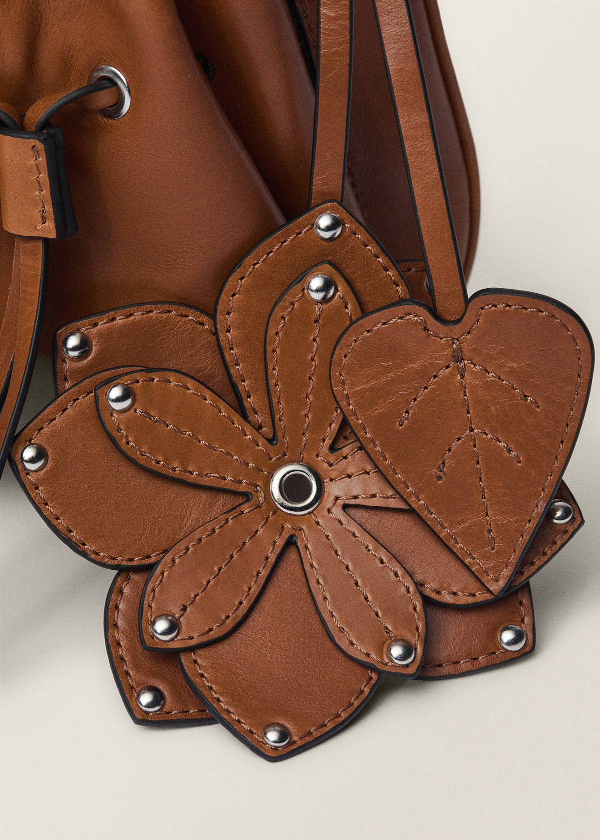 Leather shoulder bag with gathered pockets — Leather