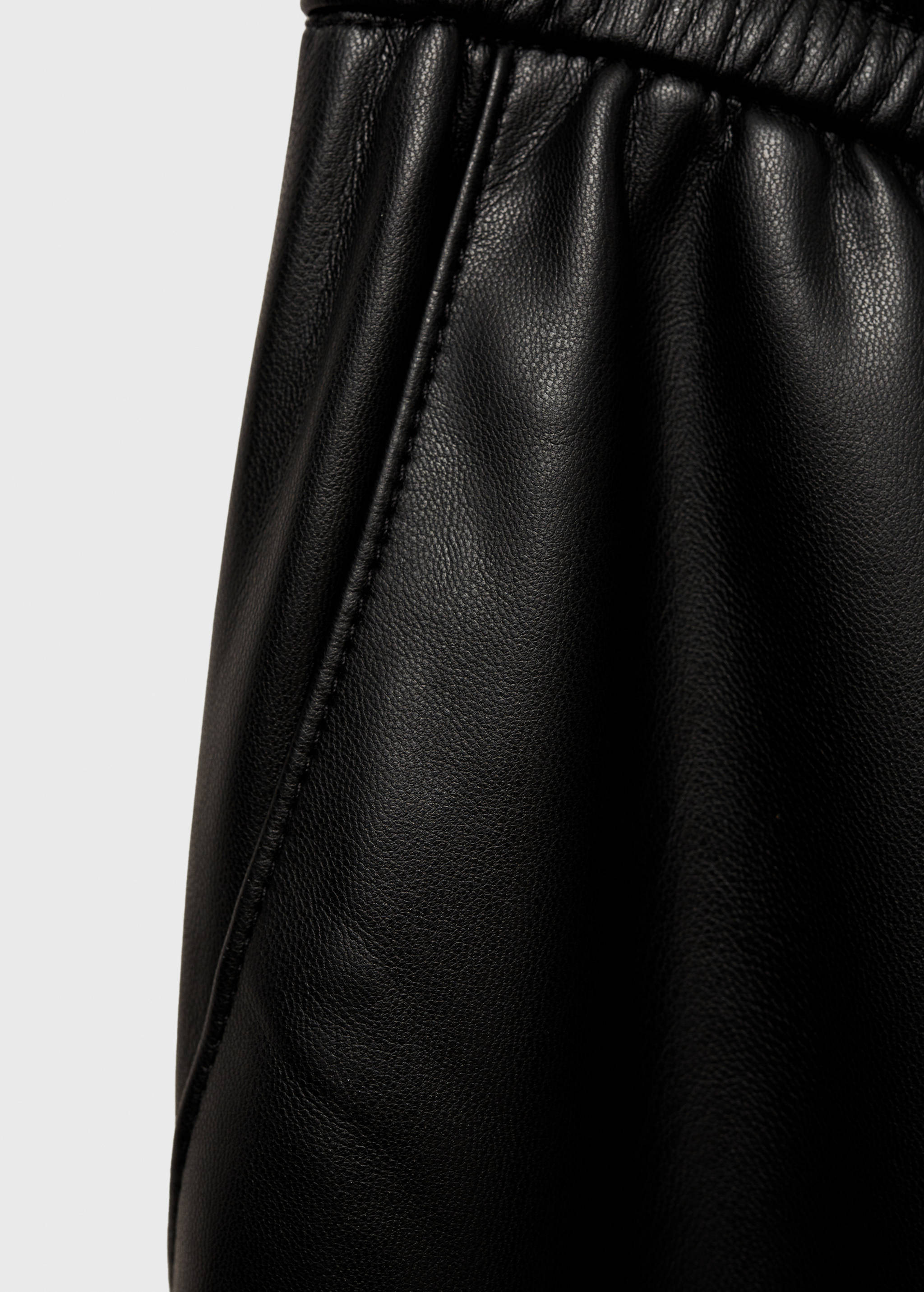 Faux-leather trousers with elastic waist - Details of the article 0