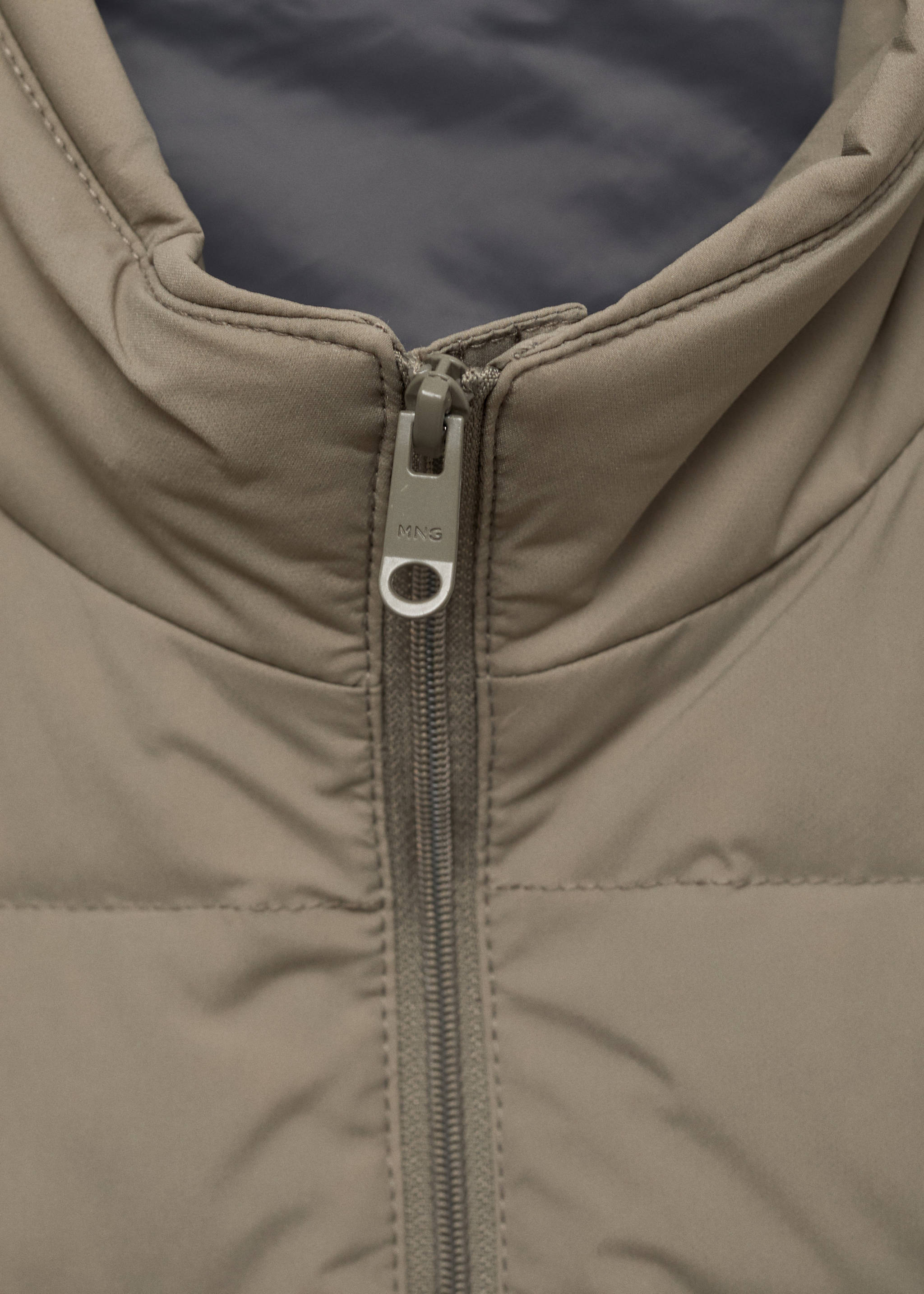 Gilet matelassé rembourrage duvet et plumes - Détail de l'article 8