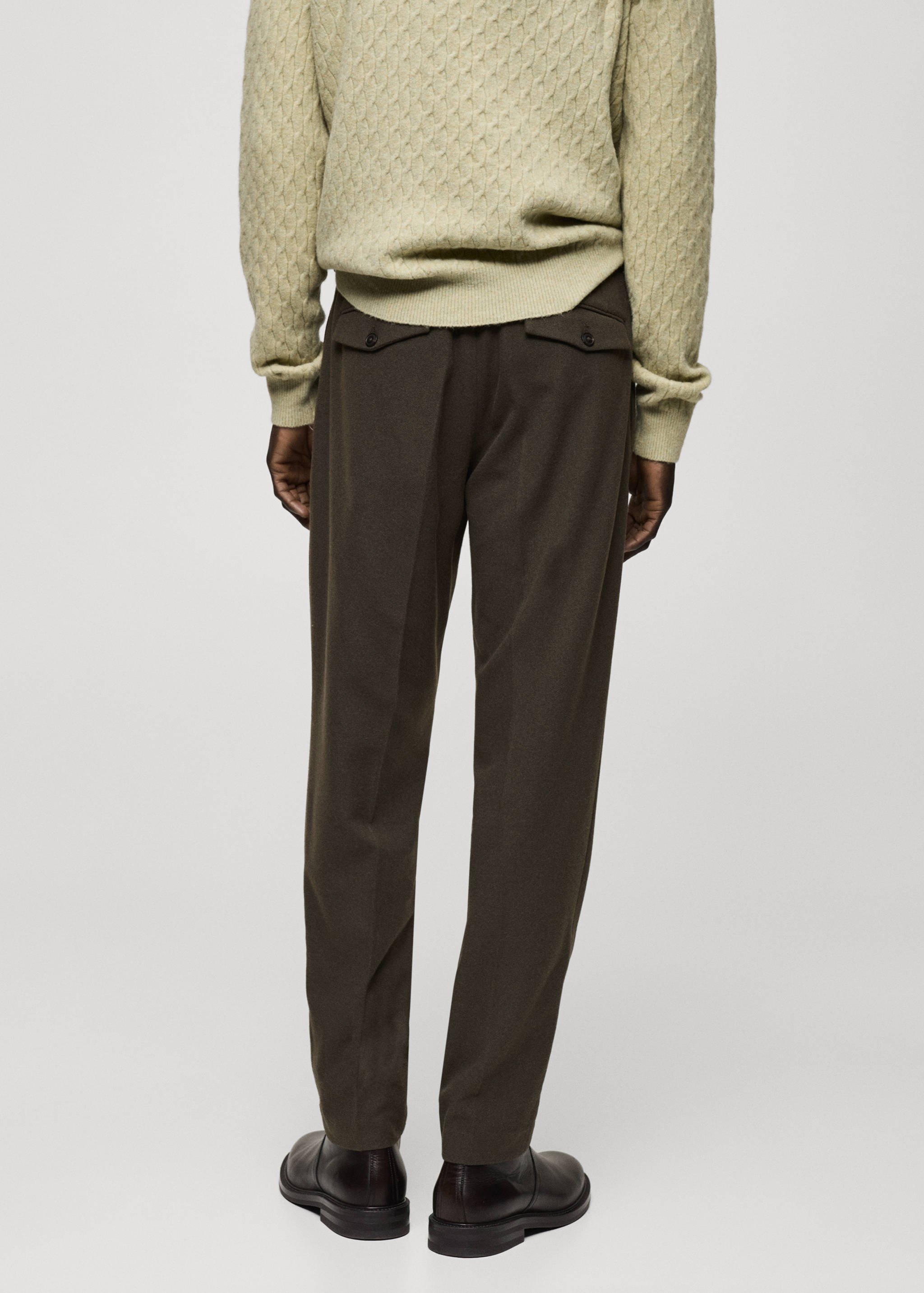 Wool flannel trousers with pleats - Reverse of the article