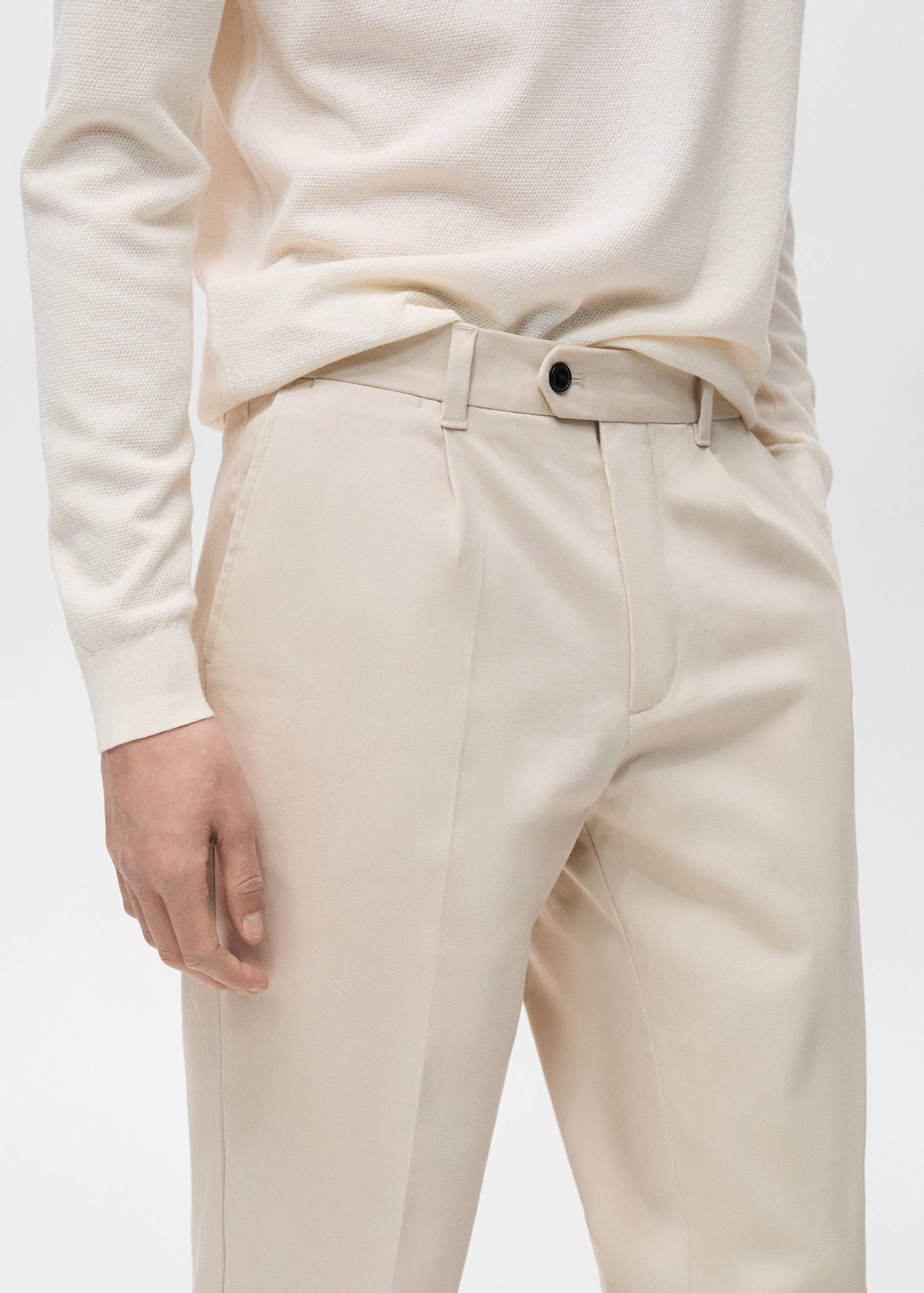 Pleated trousers under cuff - Details of the article 1
