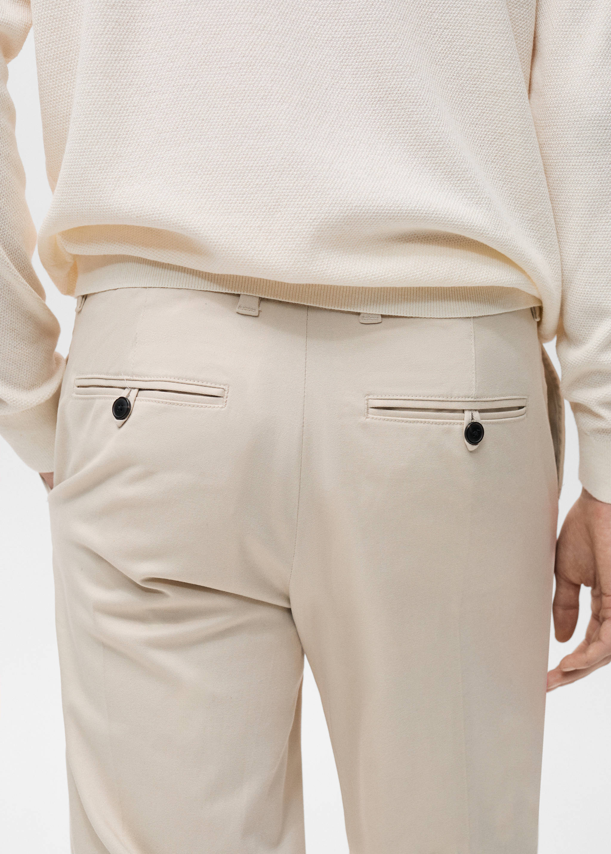 Pleated trousers under cuff - Details of the article 6