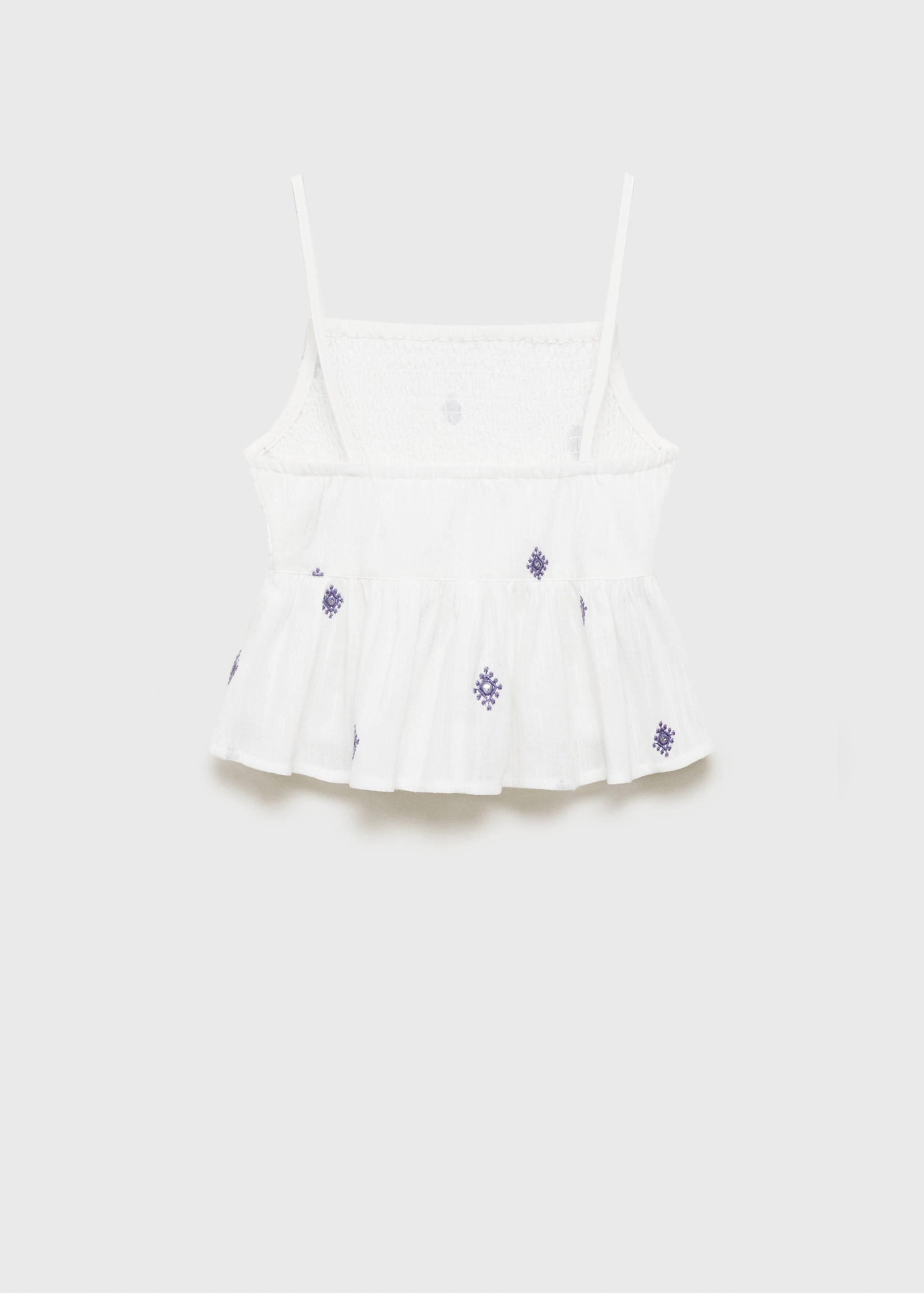 Ruffled blouse with embroidered details - Reverse of the article