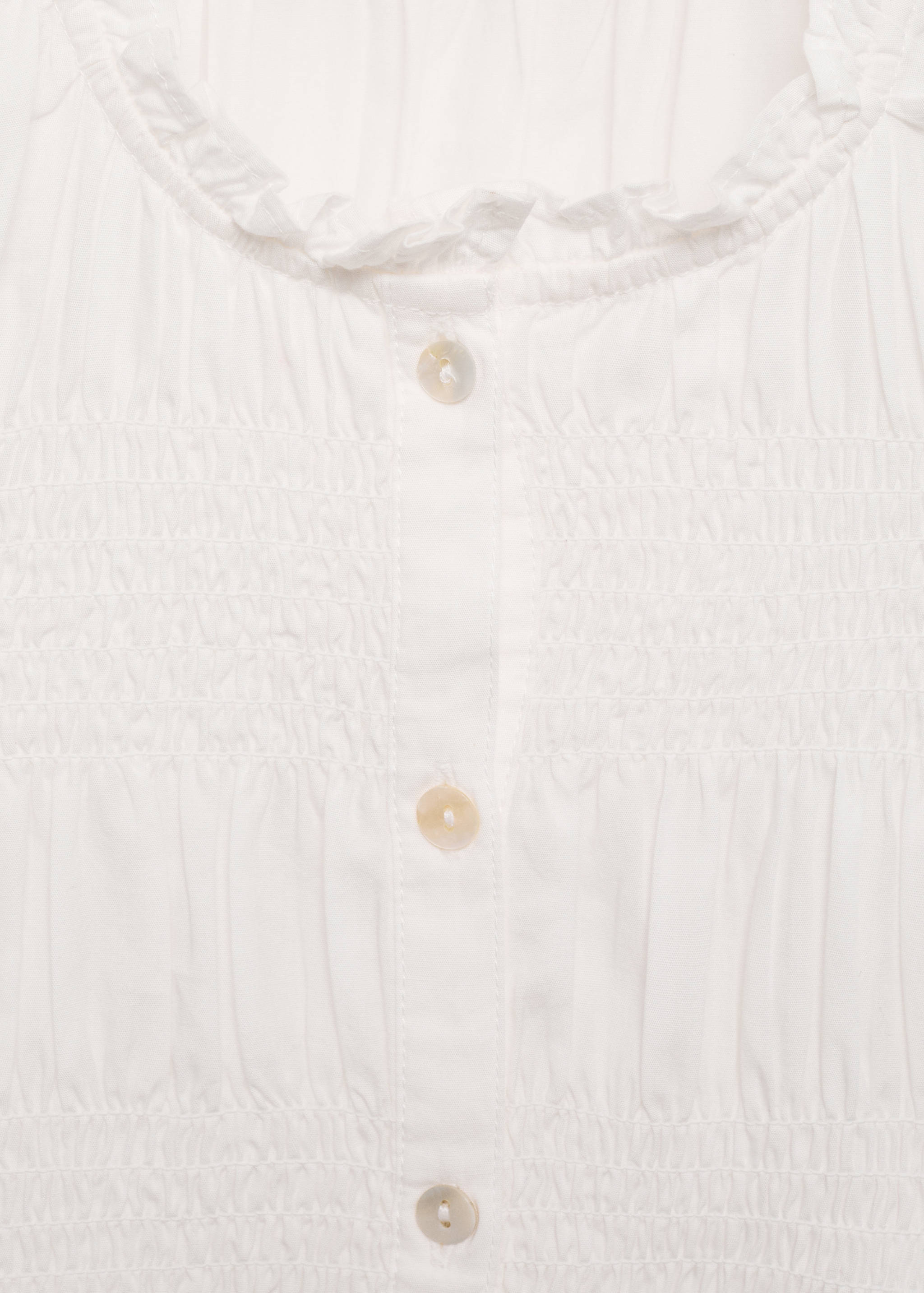 Blusa rufada com folho - Pormenor do artigo 8