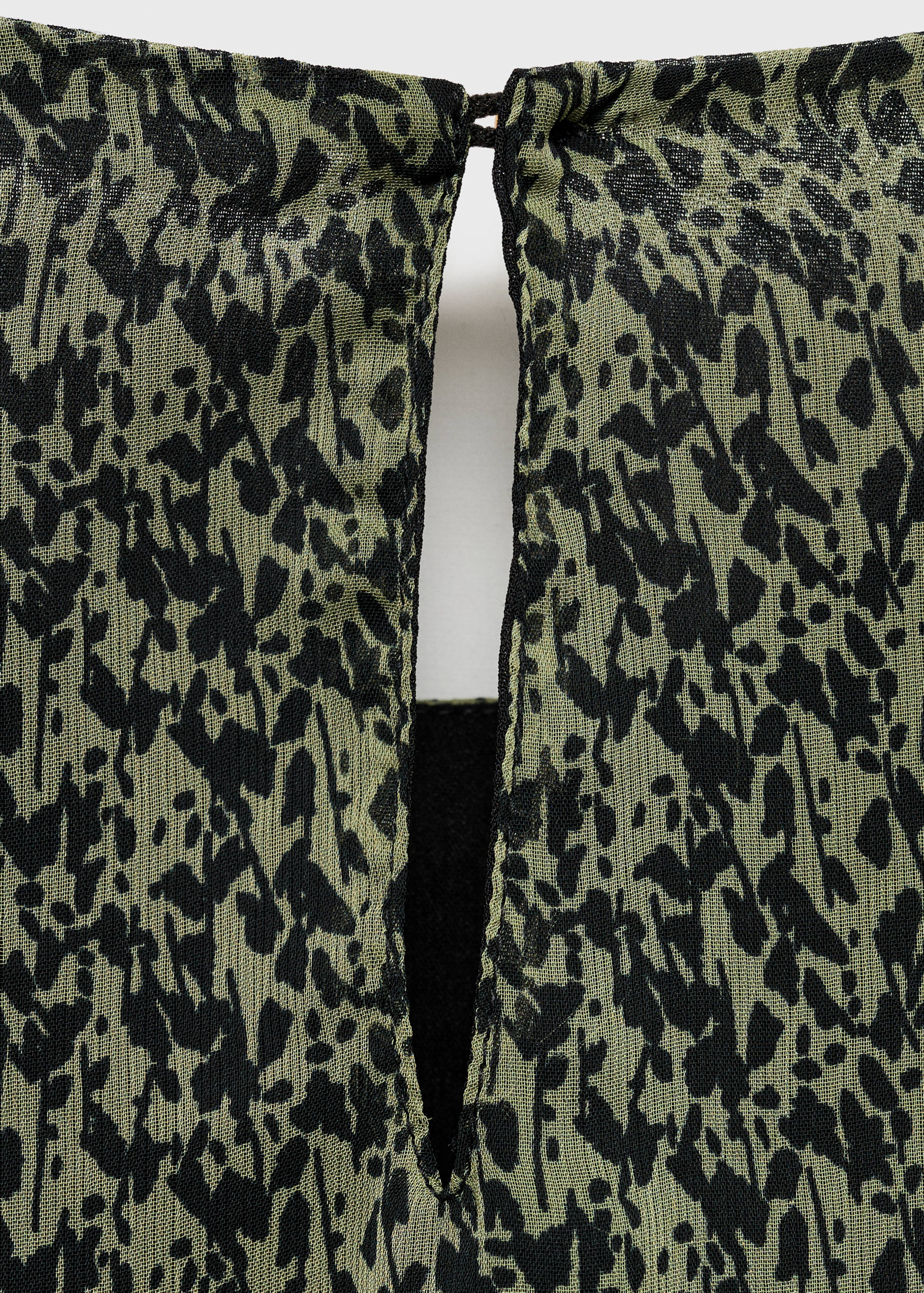 بلوزة غير متماثلة - تفاصيل المنتج 0