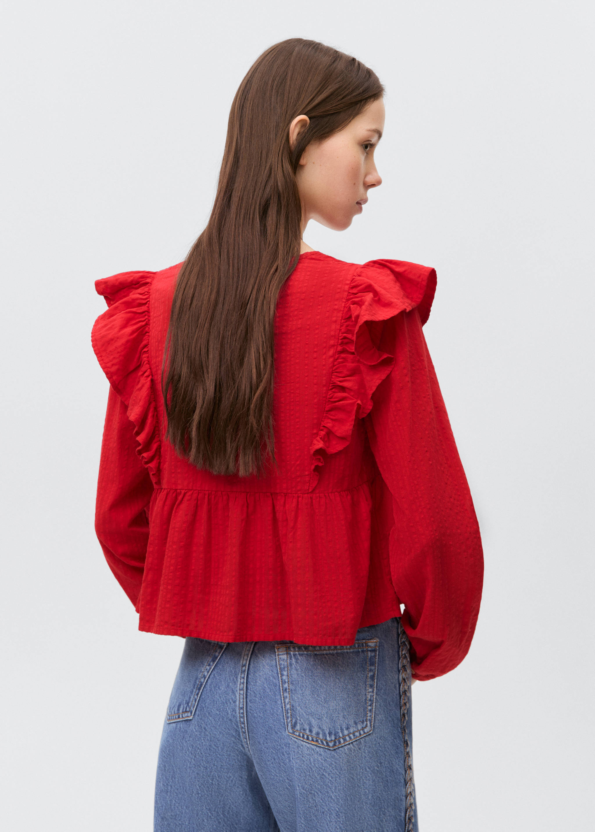 Ruffle shoulders blouse - Reverse of the article