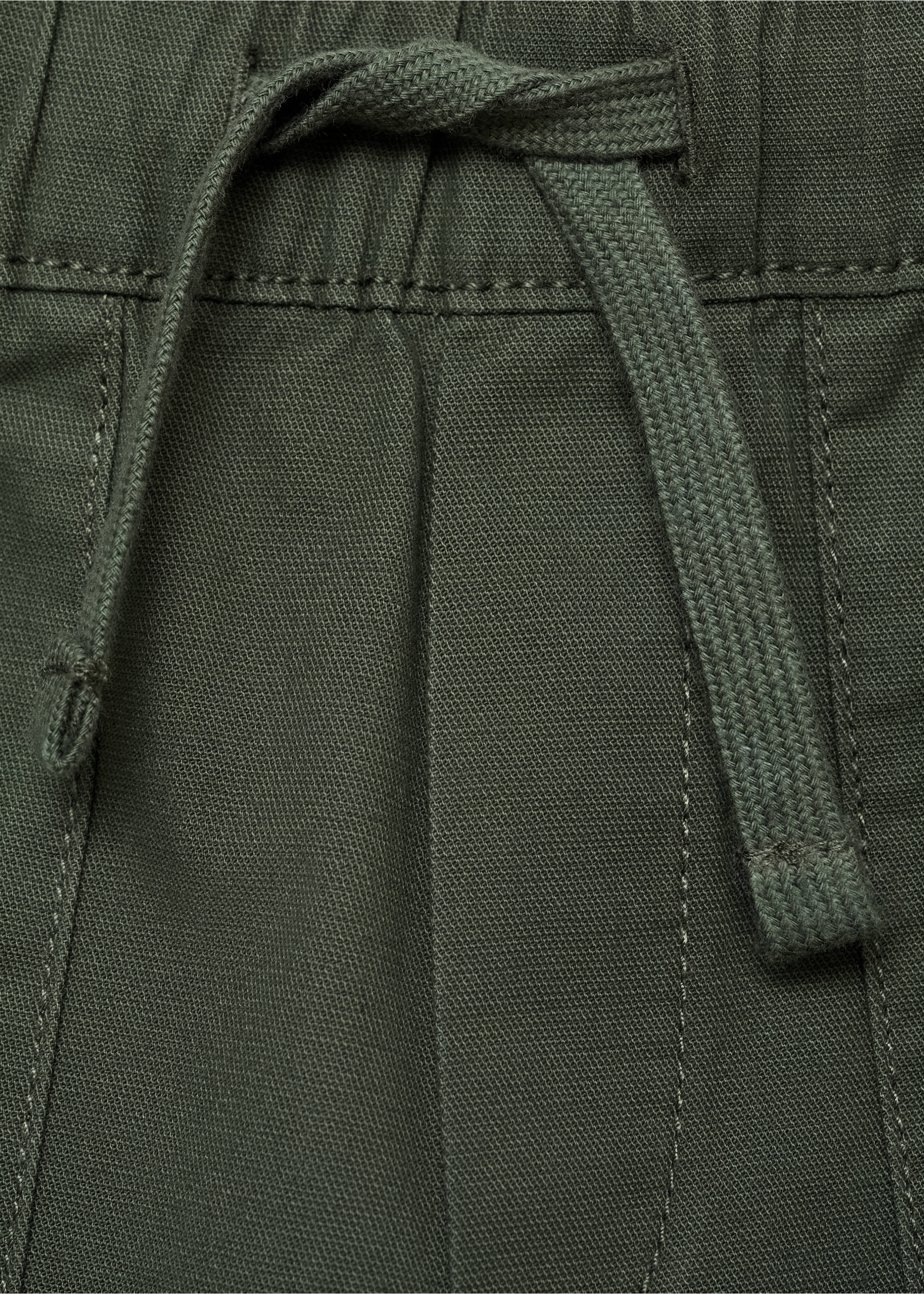 Jogger trousers - Details of the article 8, Dark Green. Ref: 87033638-00.