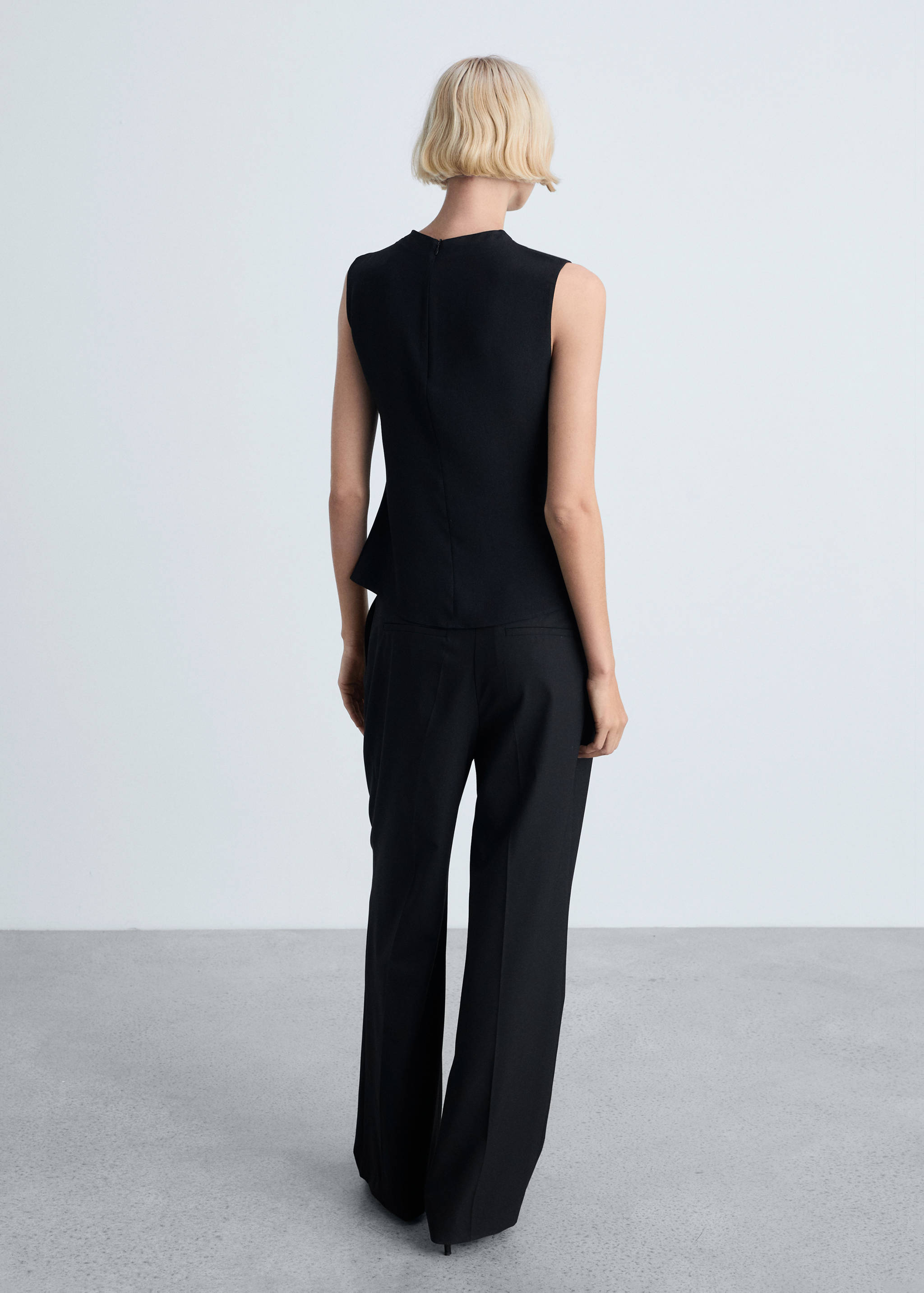 Sleeveless draped blouse - Reverse of the article