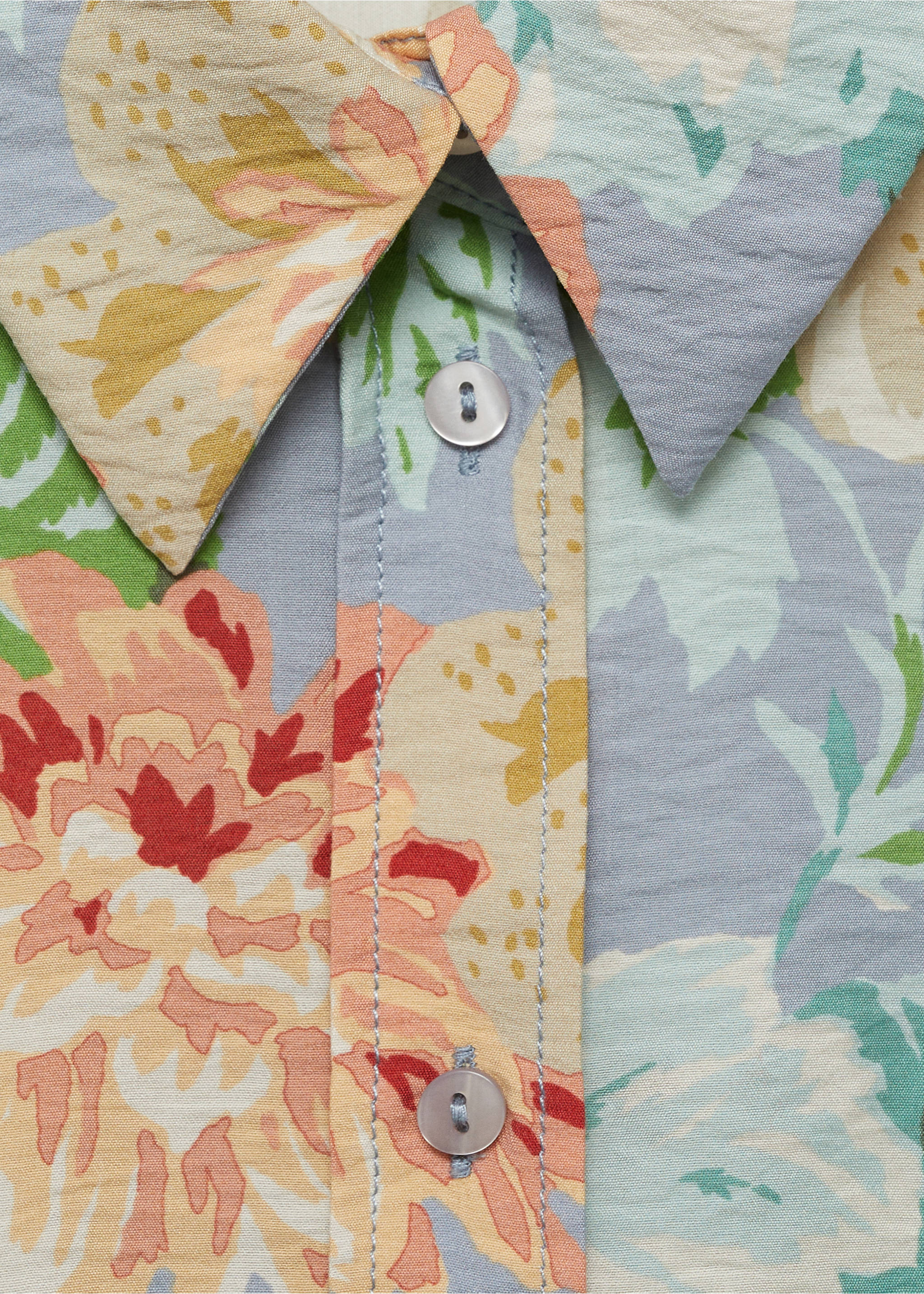 Close-up of a floral print shirt with a pointed collar and button placket., Sky Blue. Ref: 87034813-00.