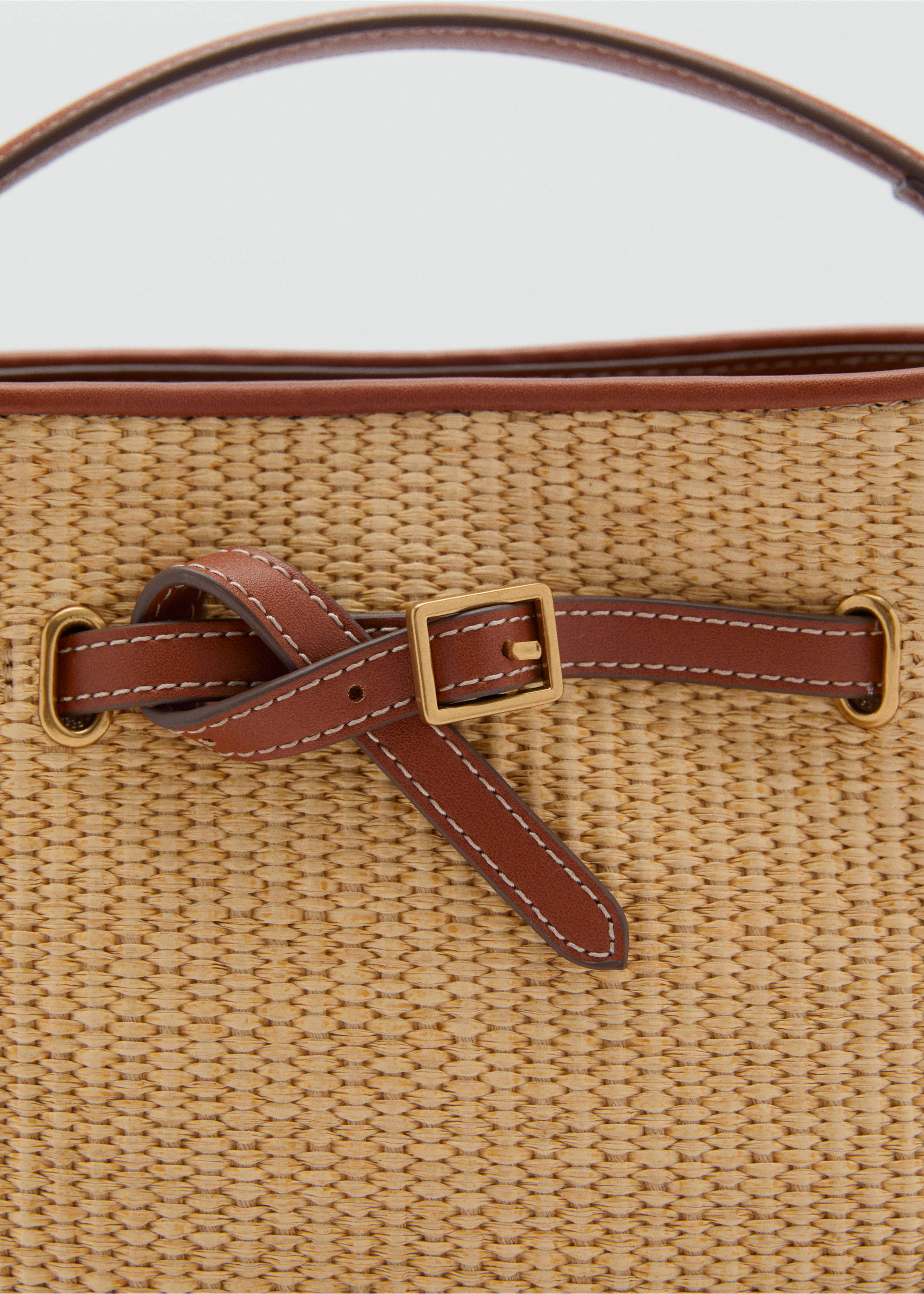 Raffia-effect bucket bag - Details of the article 1, Leather. Ref: 87036715-00.