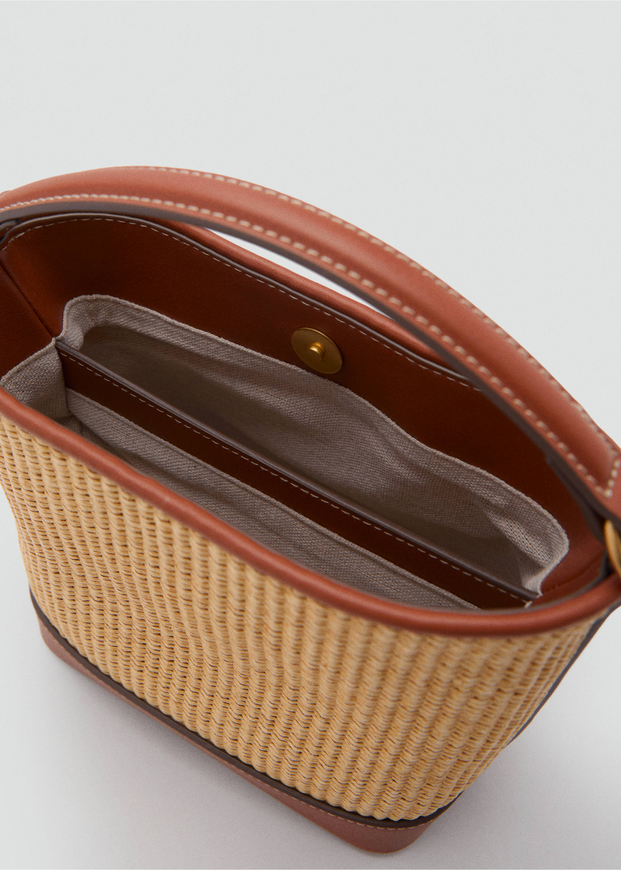 Raffia-effect bucket bag - Details of the article 2, Leather. Ref: 87036715-00.